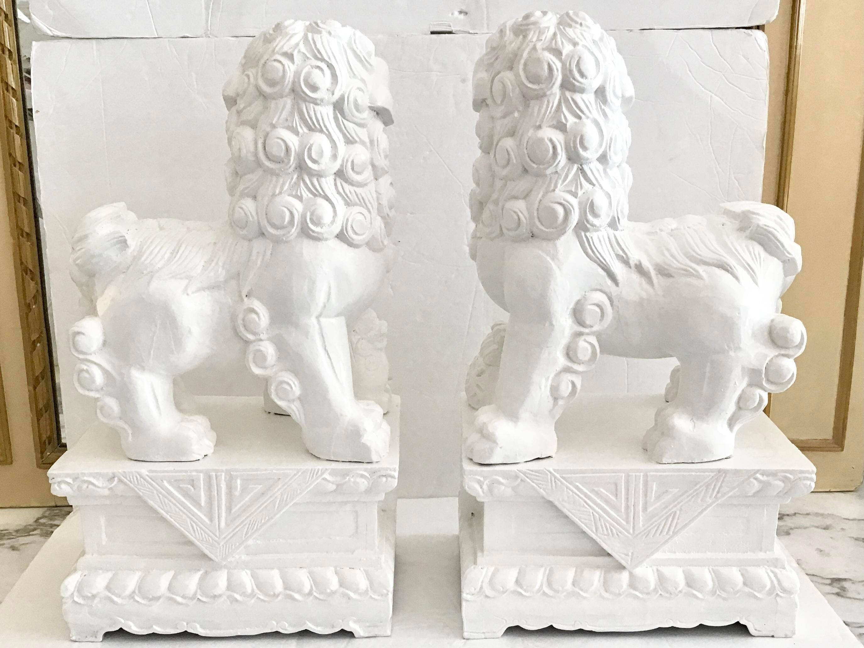 White Foo Dogs Carved in Wood Base Geometrical Figures, a Pair In Good Condition For Sale In Los Angeles, CA