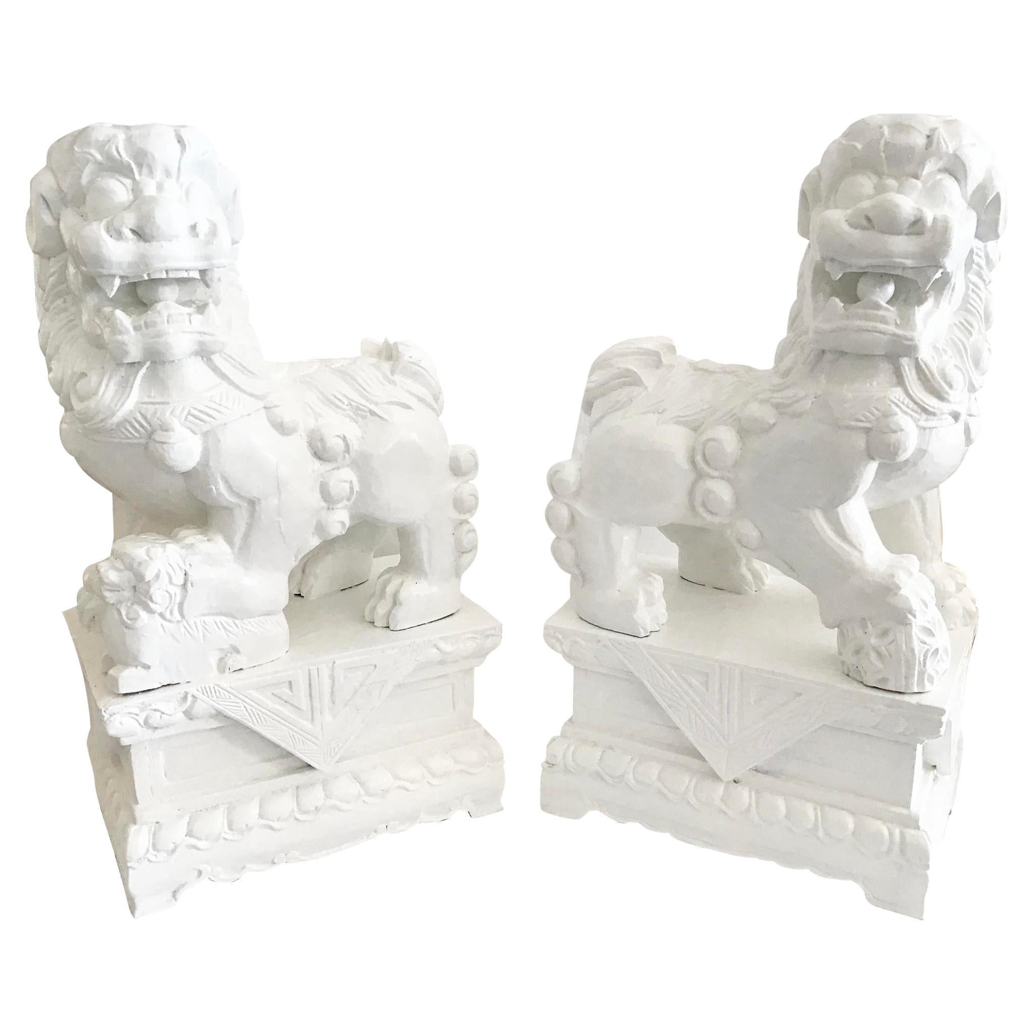 White Foo Dogs Carved in Wood Base Geometrical Figures, a Pair For Sale
