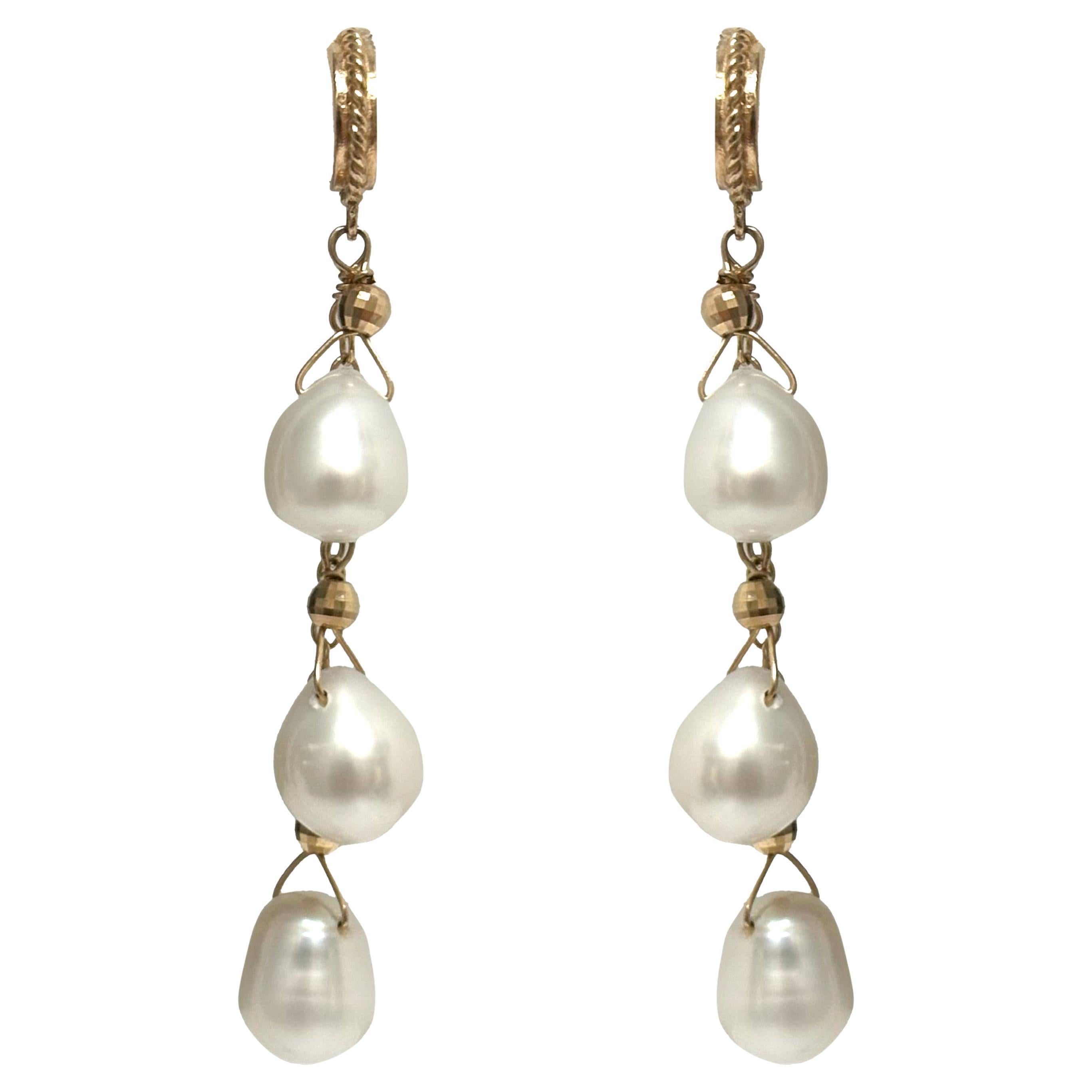 Pendientes Paradizia de perlas blancas de agua dulce colgantes en venta