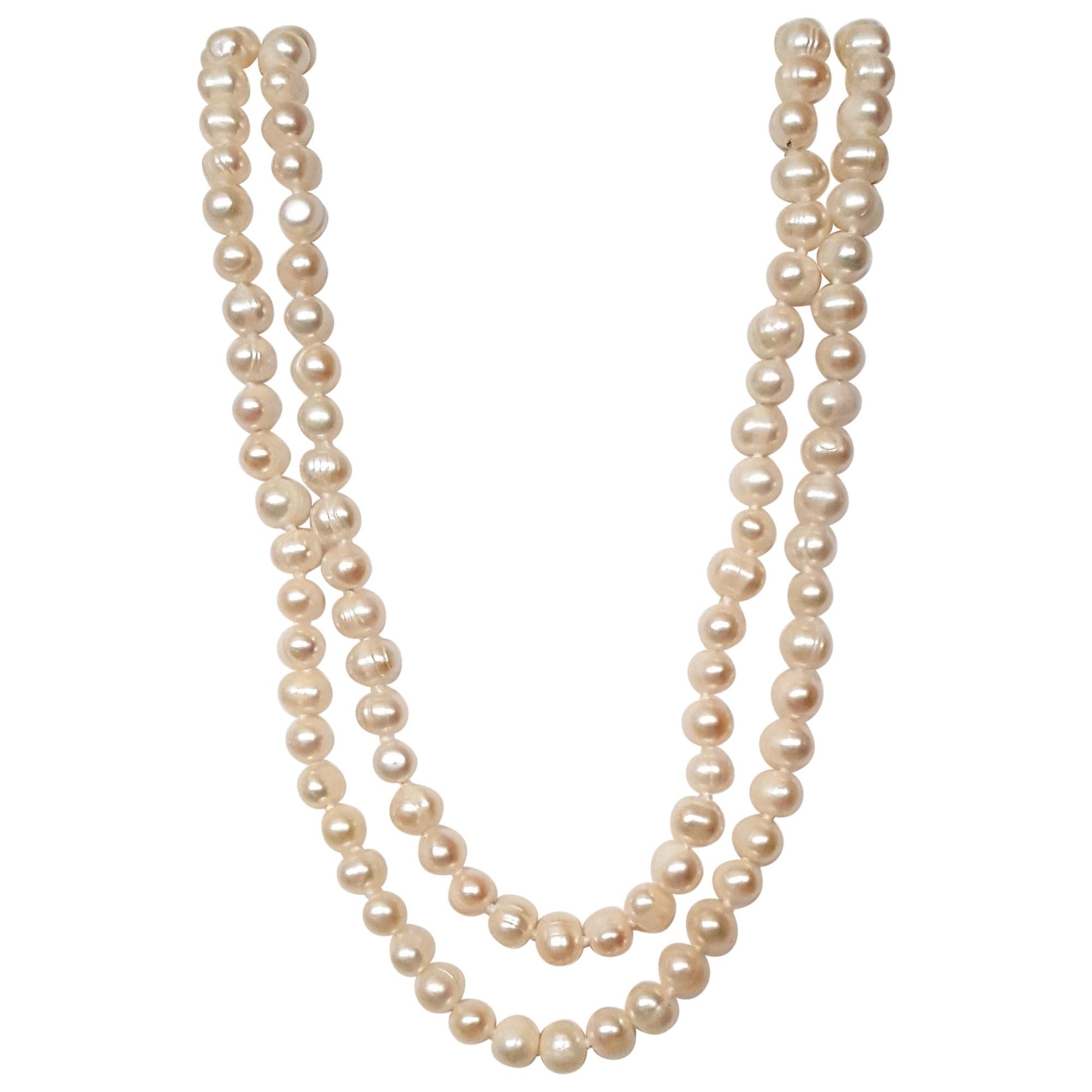 White Freshwater Pearl Strand, Lustrous, Very Good, 56 Inches, 6-8mm, Double