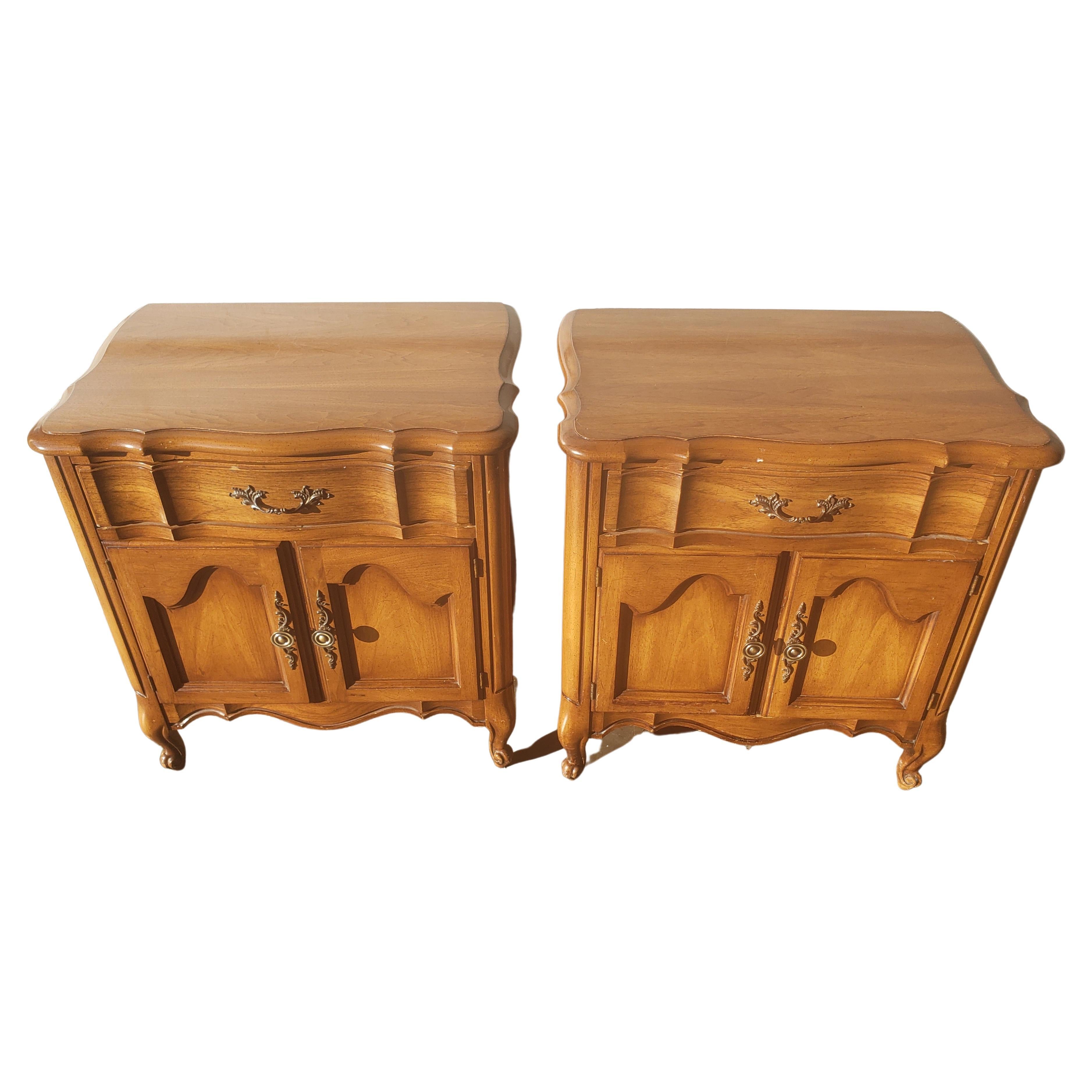 Pair White Furniture French country maple nightstands. Circa 1970s.
Original French Country handles. All dovetail drawers working flawlessly. Very good vintage condition. 
Top in very good condition. Wear appropriate with use and age.
Measures