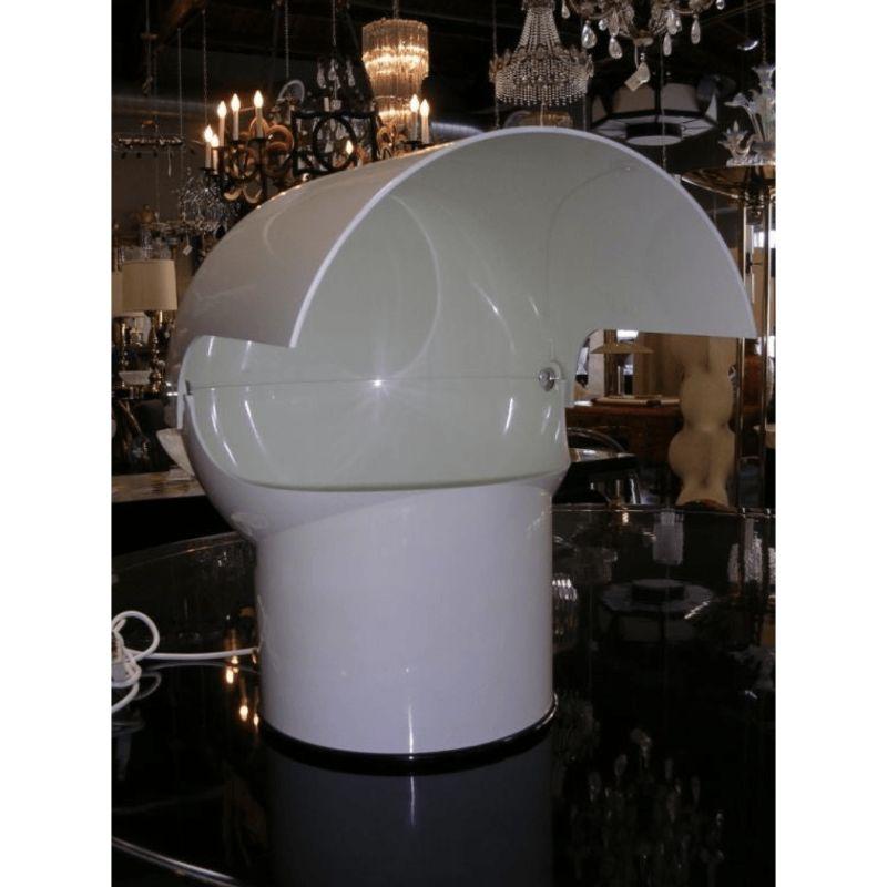 An original Gae Aulenti Helmet Lamp made by Artemide. Marked on base (Made in Milan, Italy), design Gae Aulenti. Shade is adjustable upwards and downwards. Height shown is with the shade positioned horizontally. Total length of the shade is 16