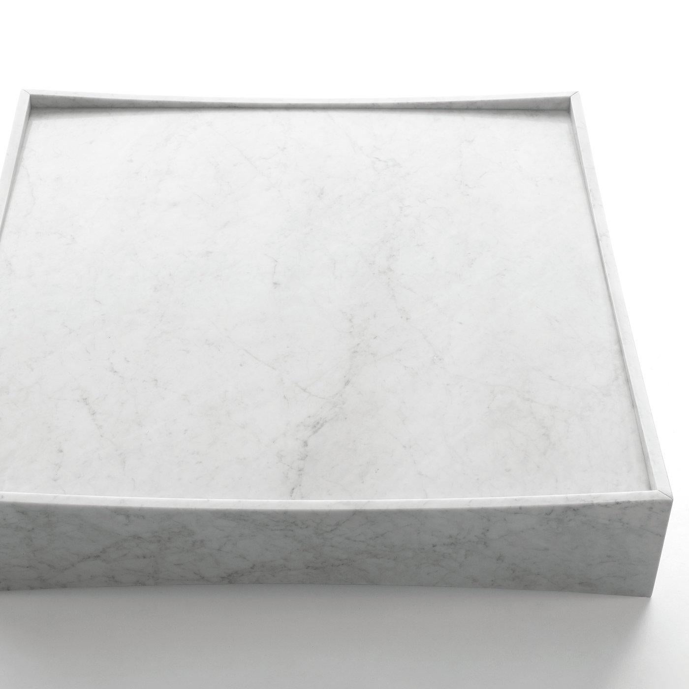 Low table, square, in white Carrara marble, matte polished finish also available in black Marquina marble, matte polished finish.
 