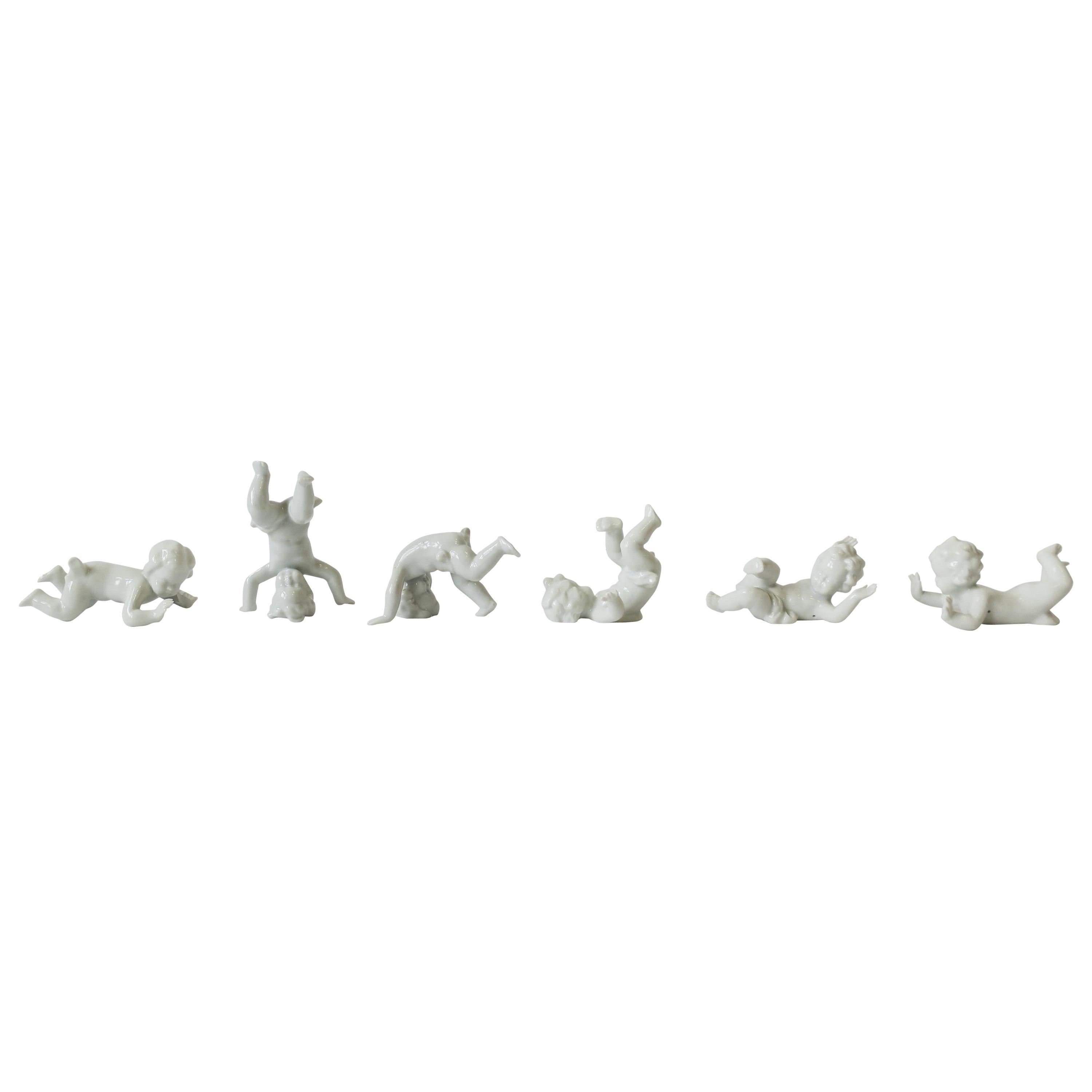 German White Porcelain Nude Putti Sculptures, Set of 6 For Sale