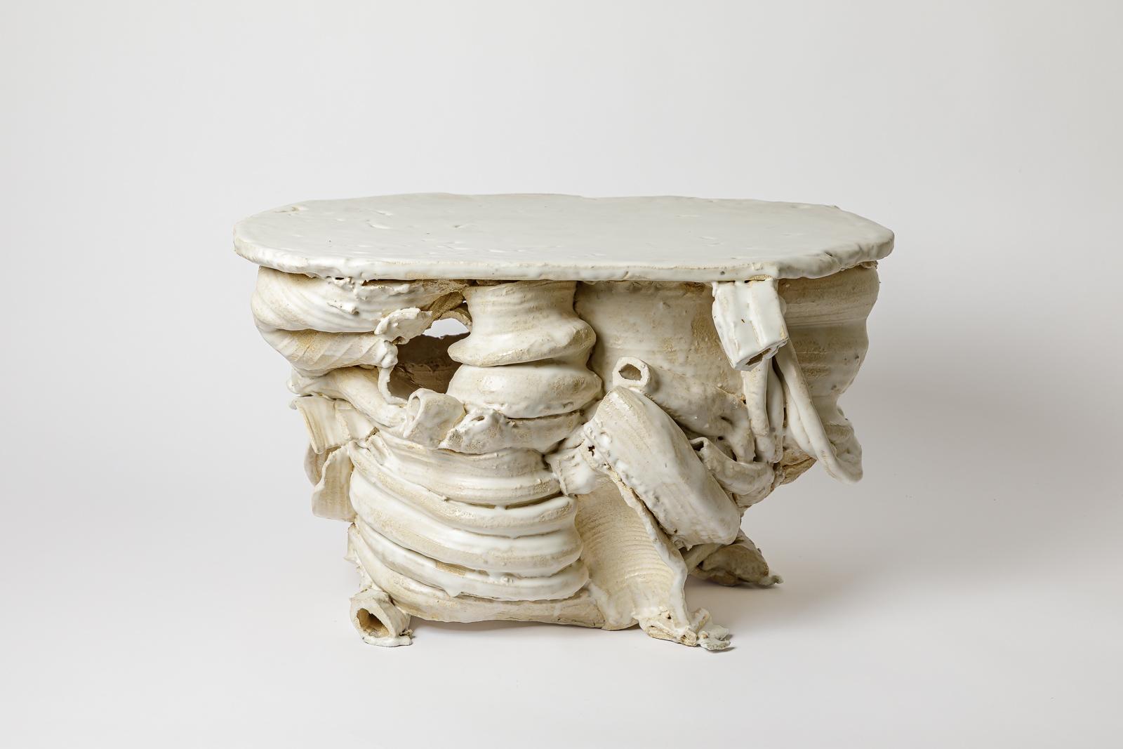 White glazed ceramic table by Patrick Crulis.
2025. Unique piece.
H : 13.6 x 24 x 16.1 inches.
Approximate sizes.