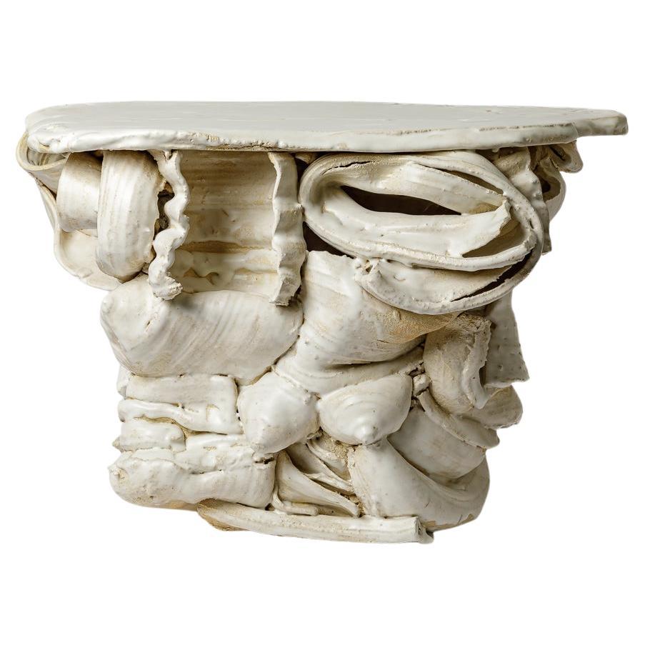White glazed ceramic table by Patrick Crulis, 2025.