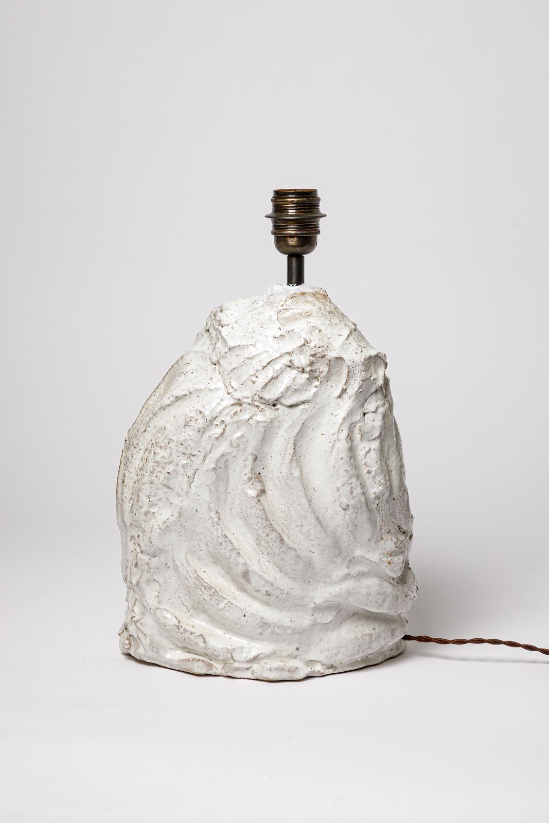 White glazed stoneware lamp base by Hervé Rousseau.
Artist signature under the base. 2022.
H : 13.4 x 9.4 x 5.5 inches (ceramic only).
H : 16.5 inches (ceramic and electrical system).
H : 23.6 x 14.9 x 12.6 inches (ceramic, electrical system and