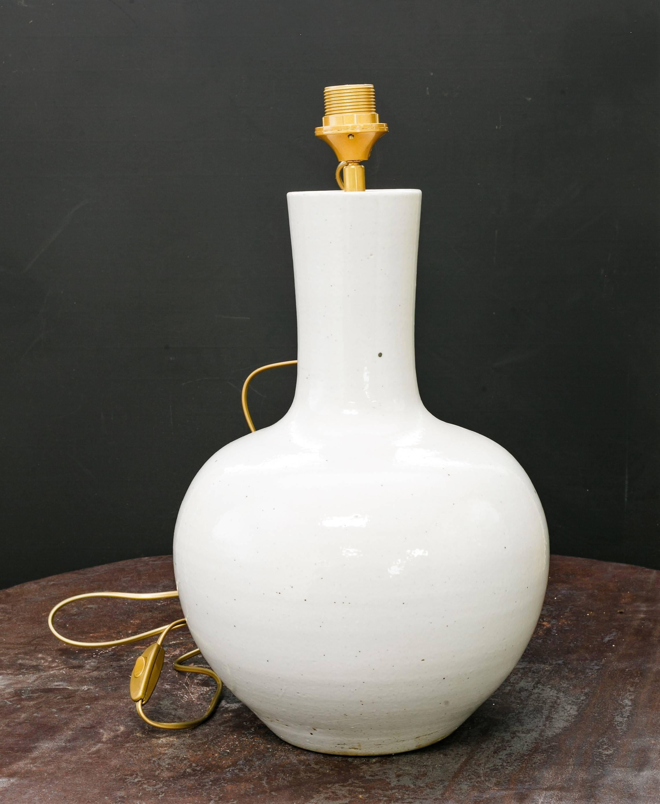 Four gourd-shaped table lamps in hand-thrown glazed stoneware. Newly wired with UL listed parts, a phenolic socket and line switch on the cord. Sold without shades. Sold separately for $1,040 each.