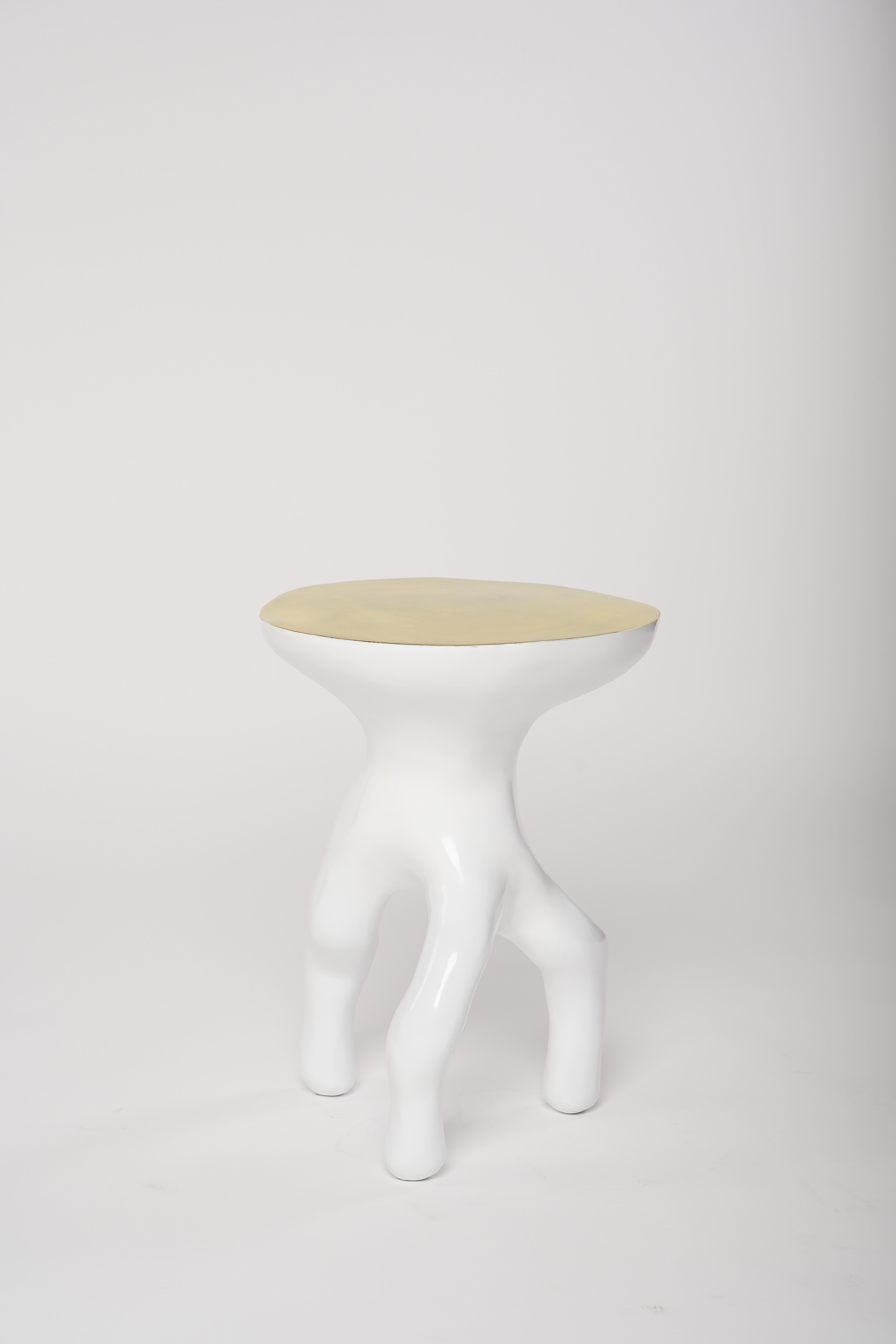 Made to order Luca Stool / Side Table by Elan Atelier. Living and on the move. Polished white bronze with exposed top, that does double duty as either a stool or side table.

Cast bronze base (lost wax technique) with a white gloss lacquer coating