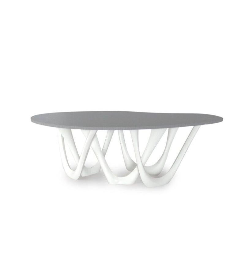 White Glossy Concrete Steel G-Table by Zieta
Dimensions: D 110 x W 220 x H 75 cm 
Material: Concrete top. Carbon steel base. 
Finish: Powder-Coated. Glossy finish. 
Available in colors: Beige, Black/Brown, Black glossy, Blue-grey, Concrete grey,