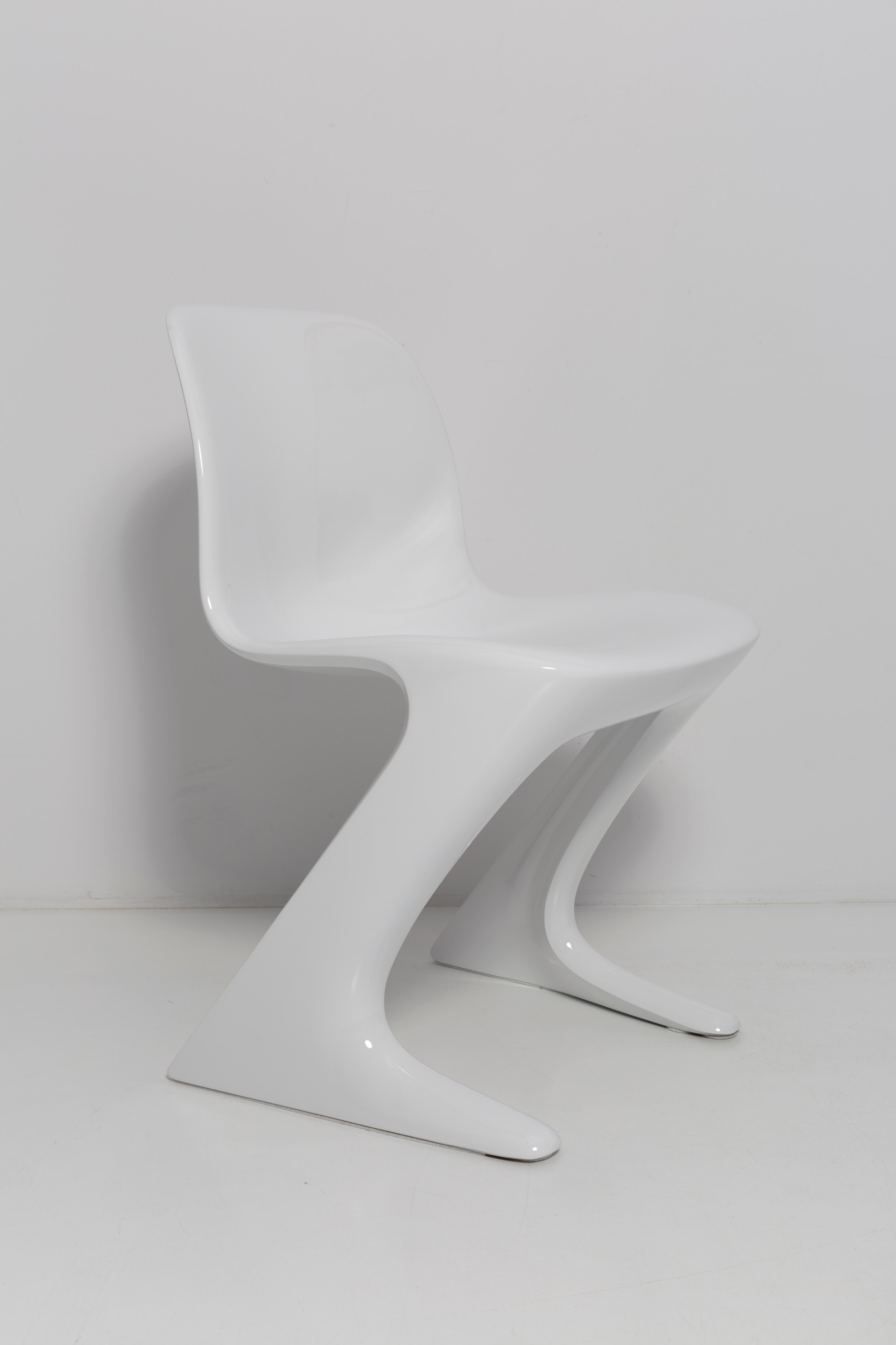 This model is called Z-chair. Designed in 1968 in the GDR by Ernst Moeckl and Siegfried Mehl, German Version of the Panton chair. Also called kangoroo chair or variopur chair. Produced in eastern Germany.

Chair is after renovation - new glossy