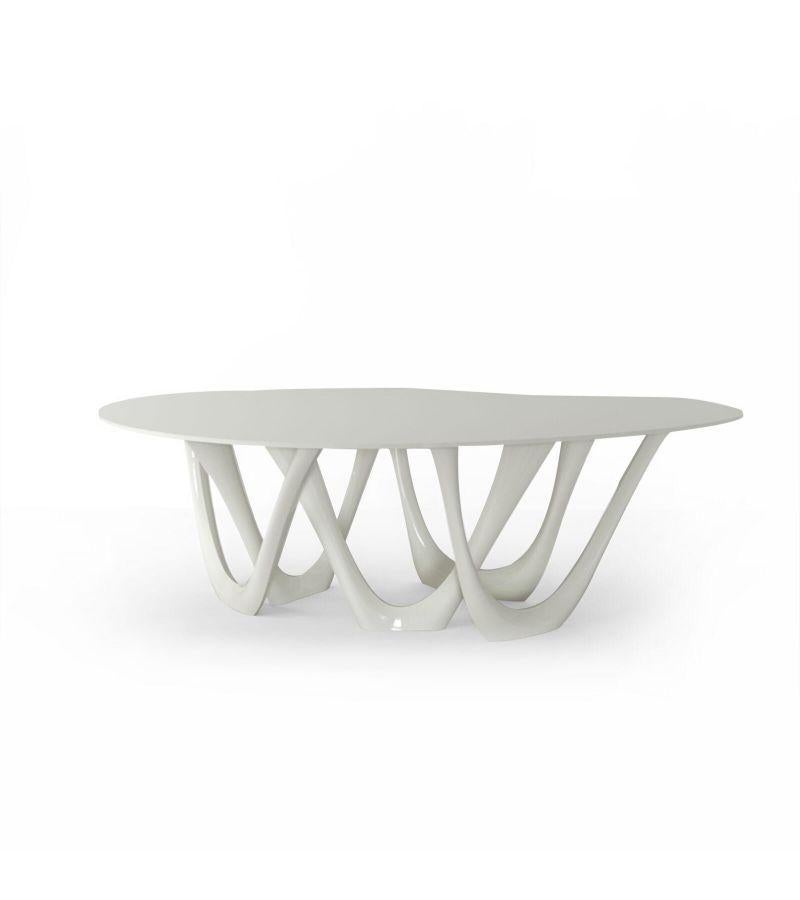 White Glossy steel G-table by Zieta
Dimensions: D 110 x W 220 x H 75 cm 
Material: Carbon steel. 
Finish: Powder-coated. Glossy finish. 
Available in colors: Beige, black/brown, black glossy, blue-grey, concrete grey, graphite, gray beige,