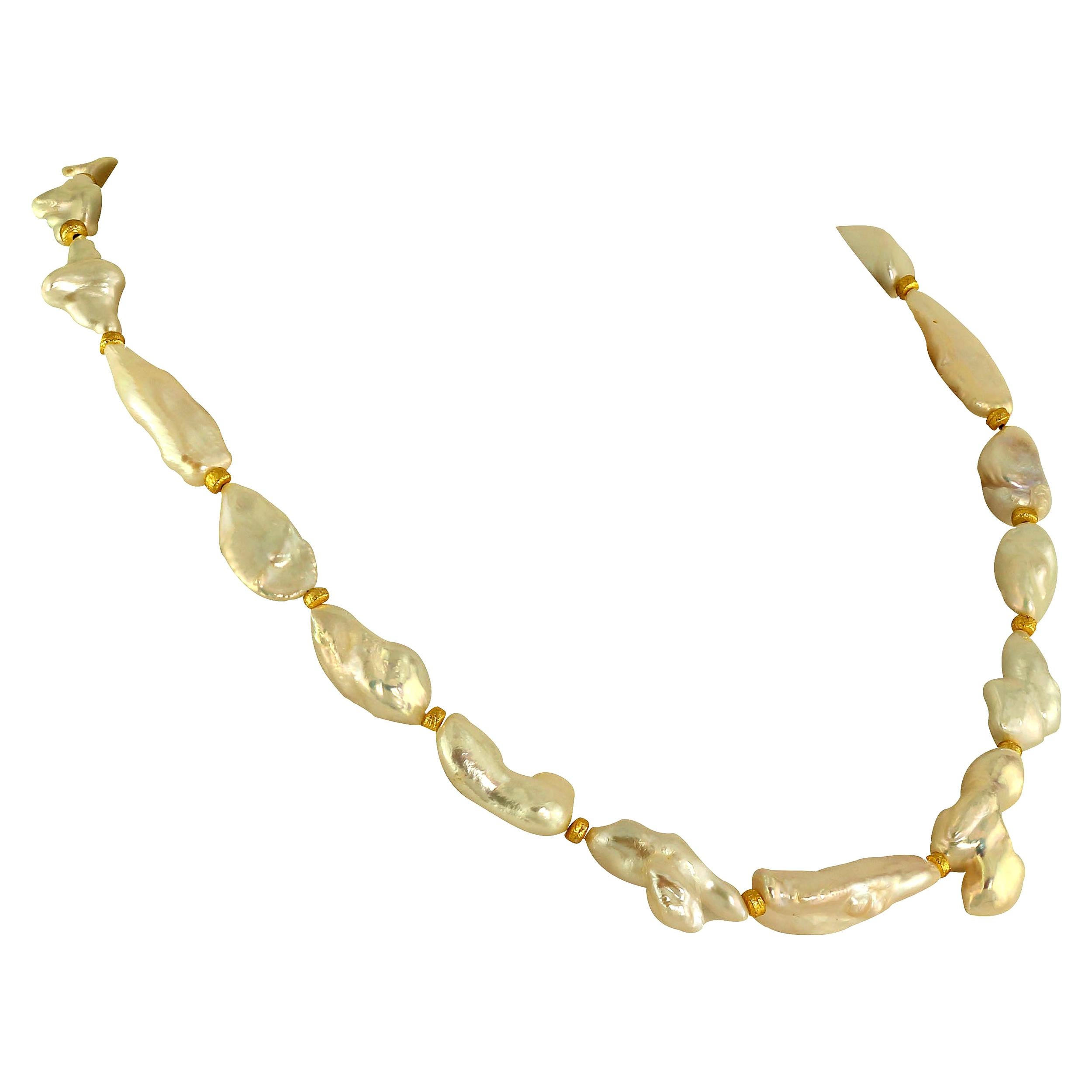 
No grit no Pearl
One of a kind, 20 inch, Freshwater white Pearl necklace with gold (22K plate over copper) rondelle accents. These unusual Pearls range in length from 30 to 15 MM and each is a unique shape. For the person who loves Pearls,