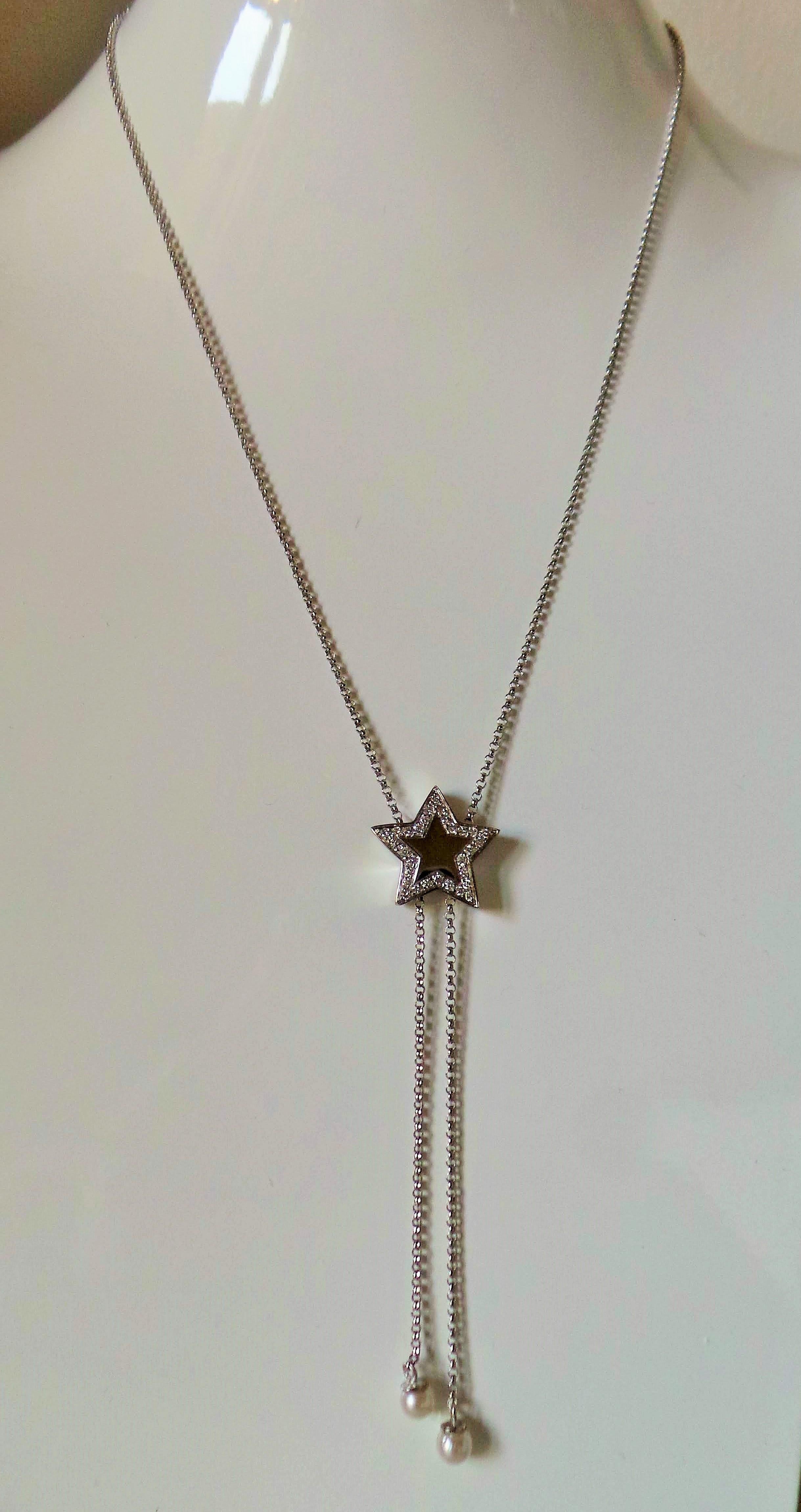 Brilliant Cut White Gold 0.30K White Diamonds Star Moving Pendant Necklace For Sale