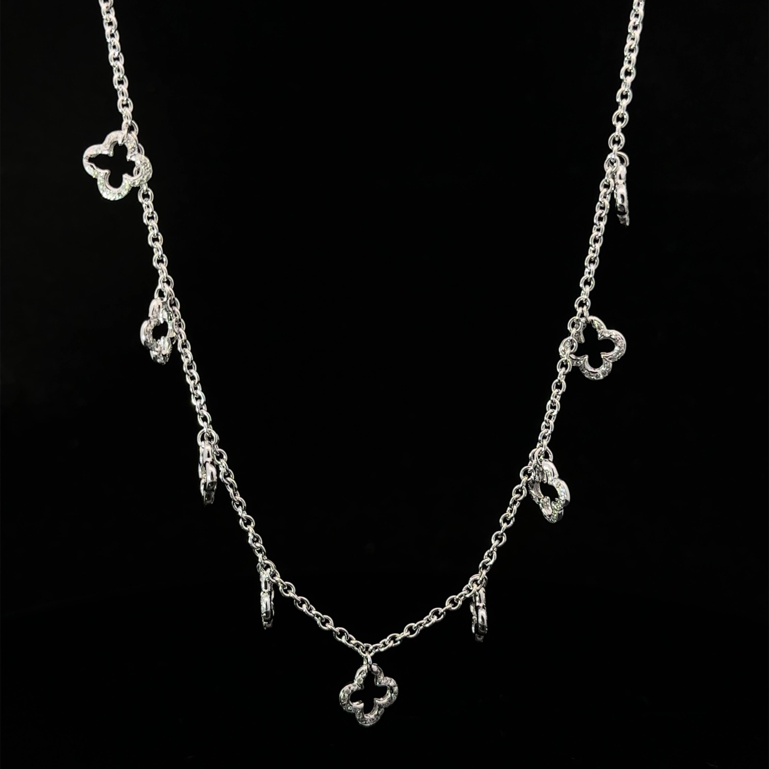 --Stone(s):--
Numerous Natural Genuine Diamonds - Round Brilliant Cut - Pave Set - Nice Brilliant White Diamonds - 0.40ctw (approx.)

Material: 18K Solid White Gold
Weight: 7.78 Grams
Chain Type: Station Cable Link
Chain Length: 18 inches
Clasp: