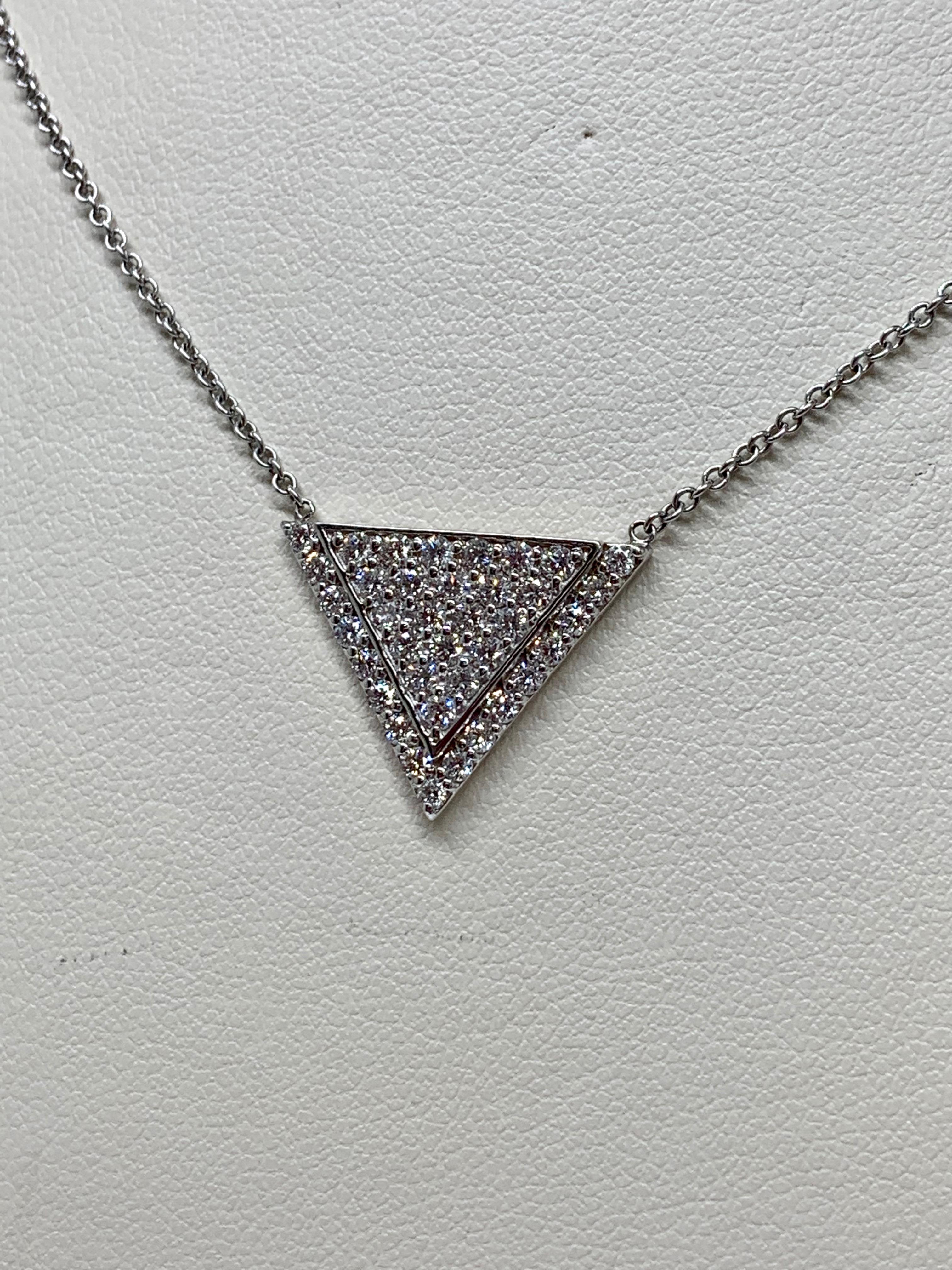 This gorgeous triangular necklace holds 0.70 carats of round white diamonds. This necklace includes an 14k white gold 18 inch, 1 millimeter cable chain with a sturdy lobster claw clasp. The pendant itself is 0.75 inches wide and 0.55 inches long. 