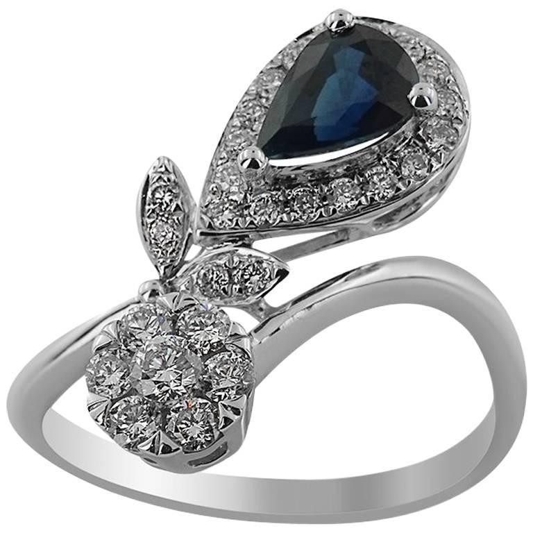 Pear Cut White Gold 0.82 ct Sapphire and Brilliant Cut 0.40 ct Diamonds Ring For Sale