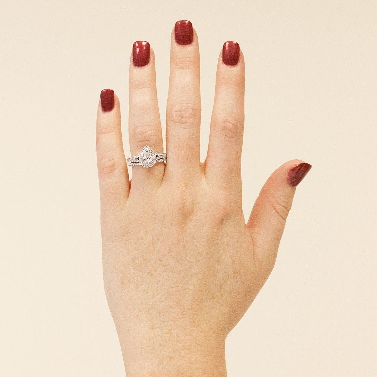 Pear Cut White Gold 0.85 Carat Pear Diamond Halo Engagement Ring