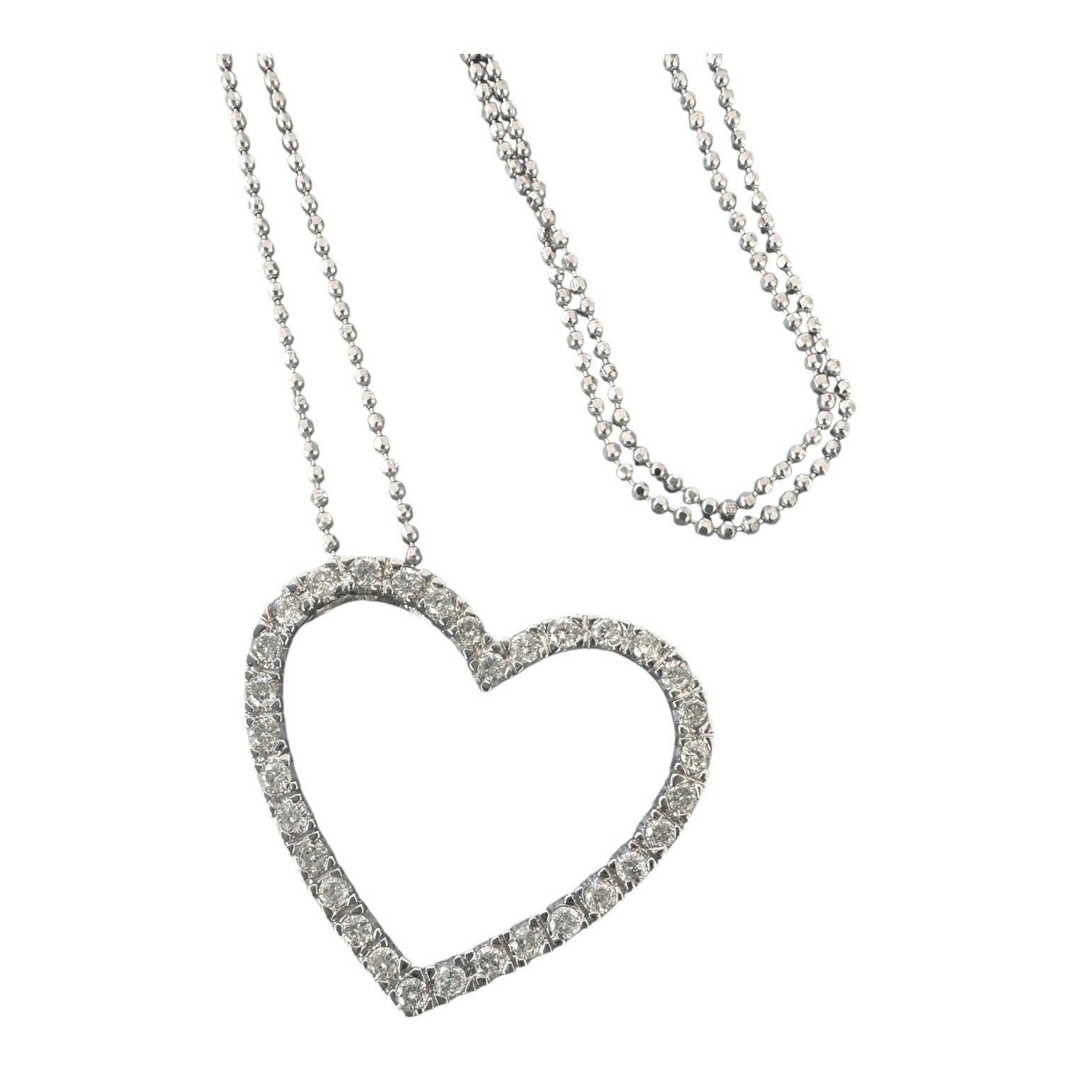 Dieser fachmännisch aus 14-karätigem Weißgold gefertigte Diamantanhänger mit Kette (0,50 Karat) verbindet Eleganz mit Luxus. Der Anhänger misst 1