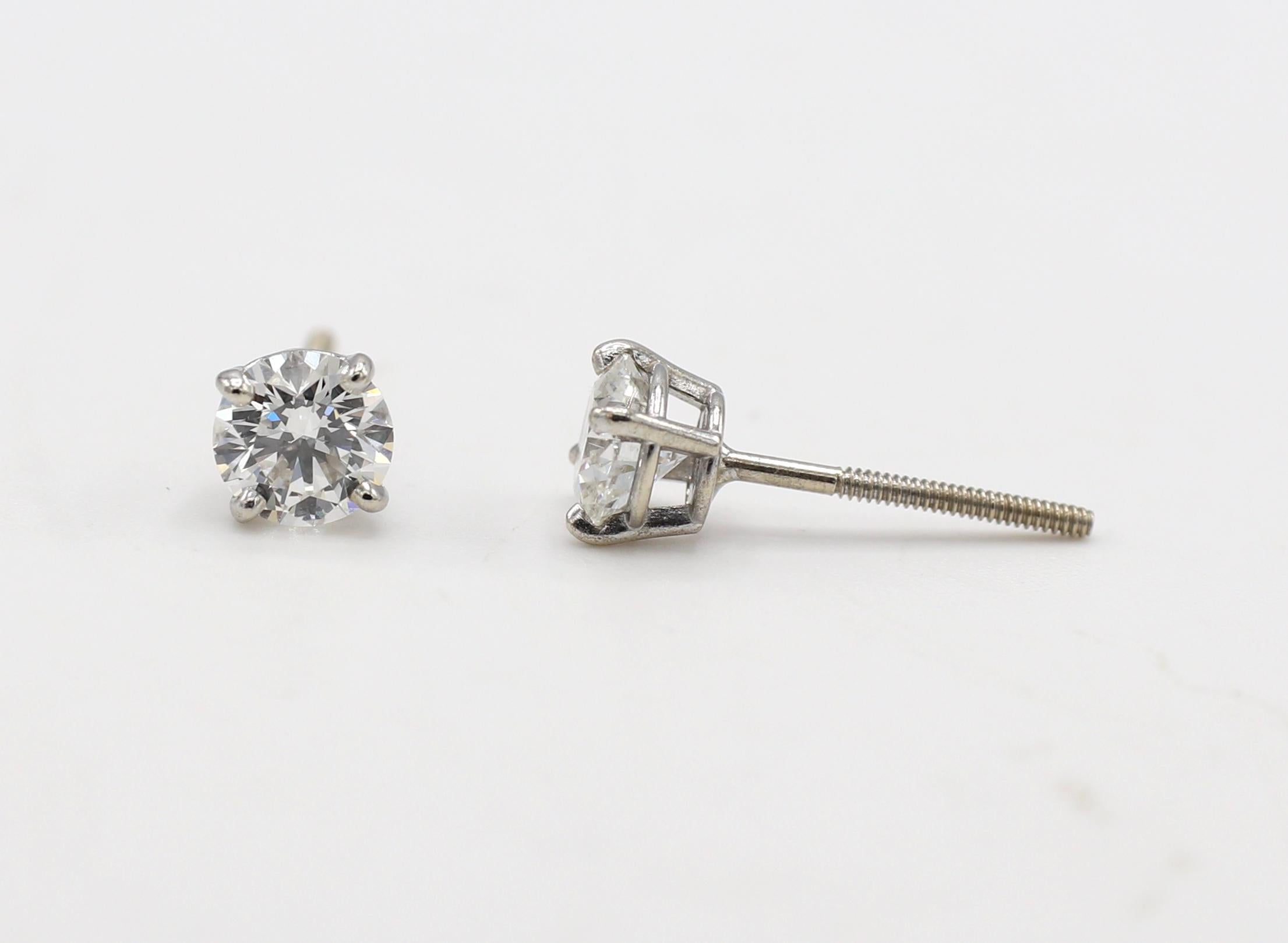White Gold 1.10 Carat Round Natural Diamond Stud Earrings
Metal: 14K white gold
Weight: 1 gram
Diamonds: 2 round natural diamonds, approx. 1.10 CTW G SI1
Backs: Screw backs
