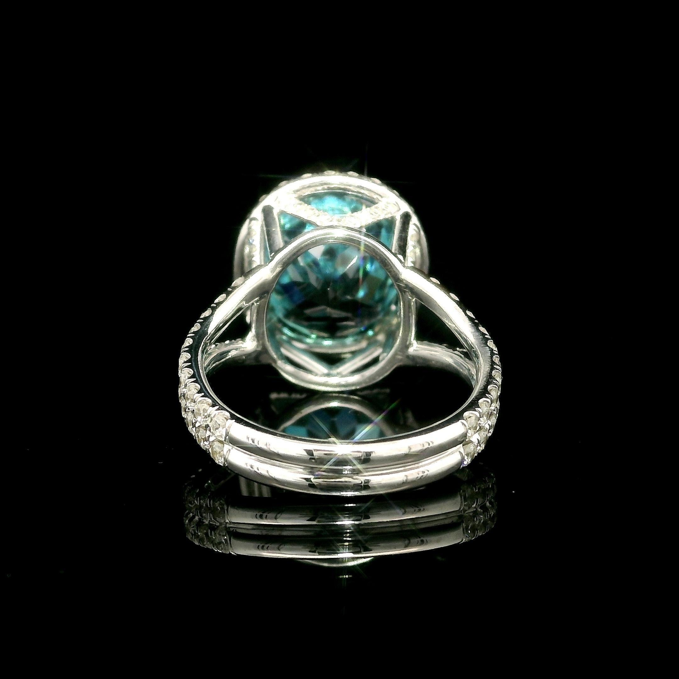 --Stones:--
1 Natural Genuine Zircon - Oval Cut - Dual Prong Set - Very Fiery Deep Greenish-Blue Color - 10.72ct approx.
** See Certification Details Below for Complete Info **
103 Natural Genuine Diamonds - Round Brilliant Cut - Prong Set -Nice