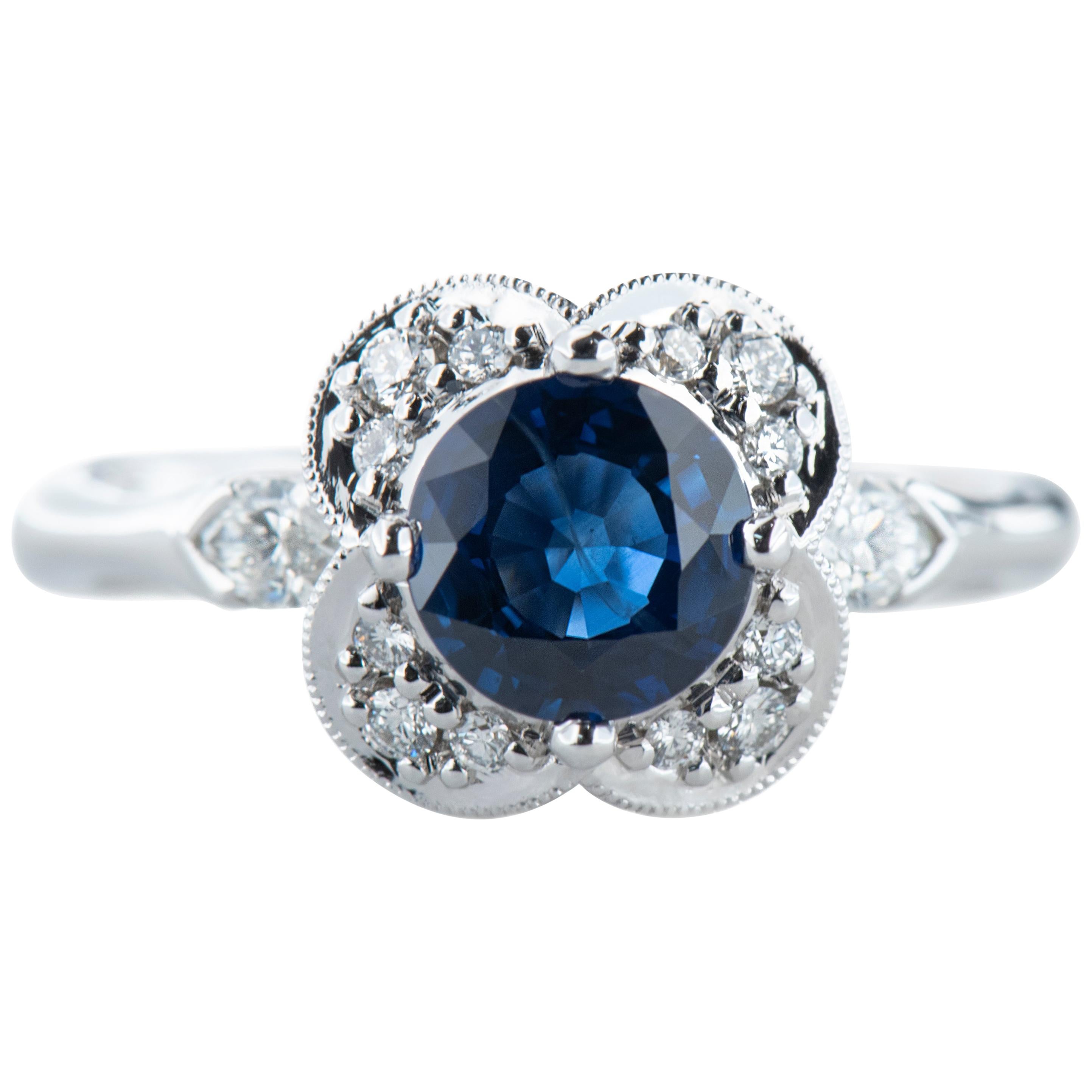 White Gold 1.20 Carat Round Blue Sapphire Floral Halo Ring with Diamond Accents For Sale