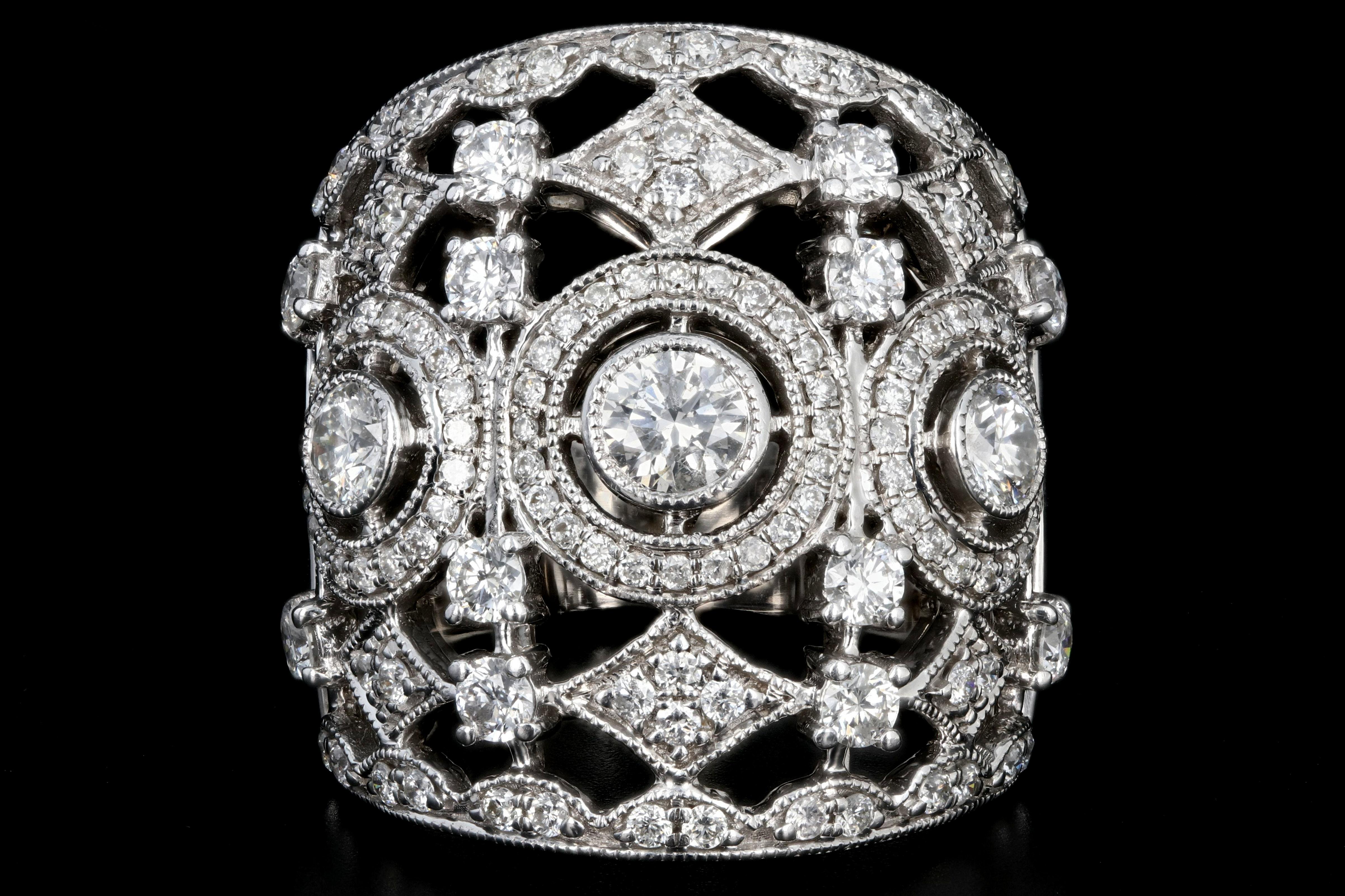 Era: Modern

Composition: 18K White Gold

Primary Stone: Round Brilliant Cut Diamonds

Carat Weight: 1.4 Carats

Color: G-H

Clarity: SI1/2

Ring Weight: 9.1 DWT

Ring Size: 8