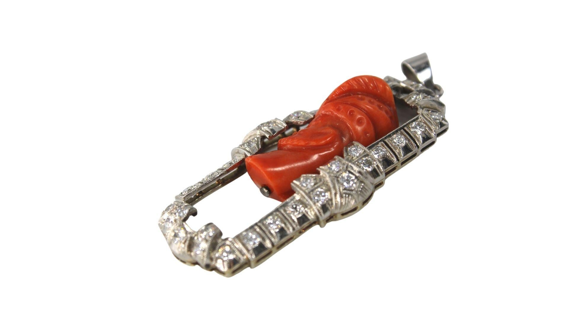 Arts and Crafts White Gold 14K Pedant With a Coral sculpted figure of a man For Sale