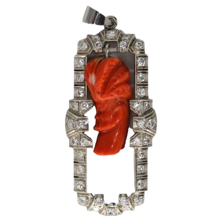 White Gold 14K Pedant With a Coral sculpted figure of a man For Sale