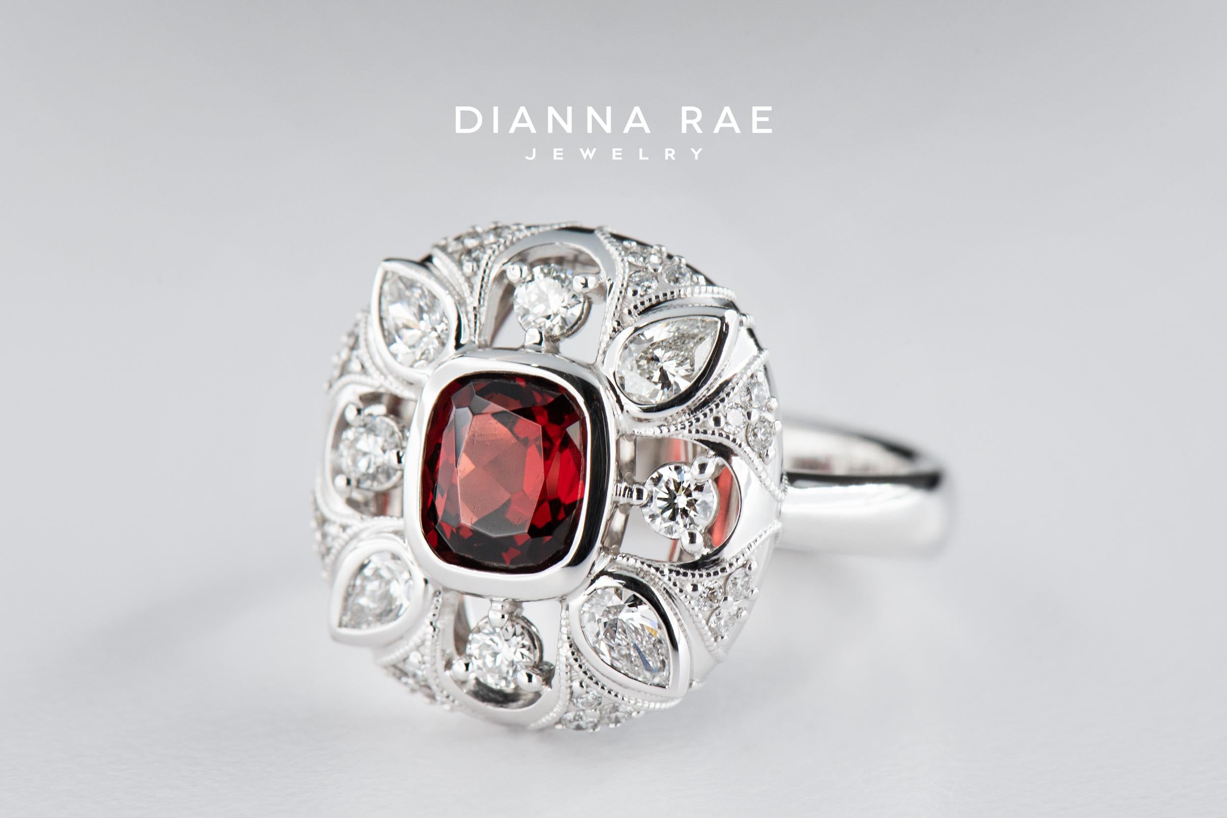 Crafted in 14k white gold, this 1.51 carat flame-red cushion Spinel most definitely catches the eye. Red Spinel is often mistaken for Ruby, so much so that the many Rubies of royalty have later been discovered to be Spinel. Simply viewing this ring
