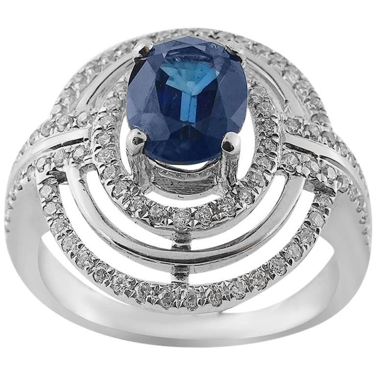 Oval Cut White Gold 1.73 ct Sapphire and Brilliant Cut 0.49 ct Diamonds Ring For Sale