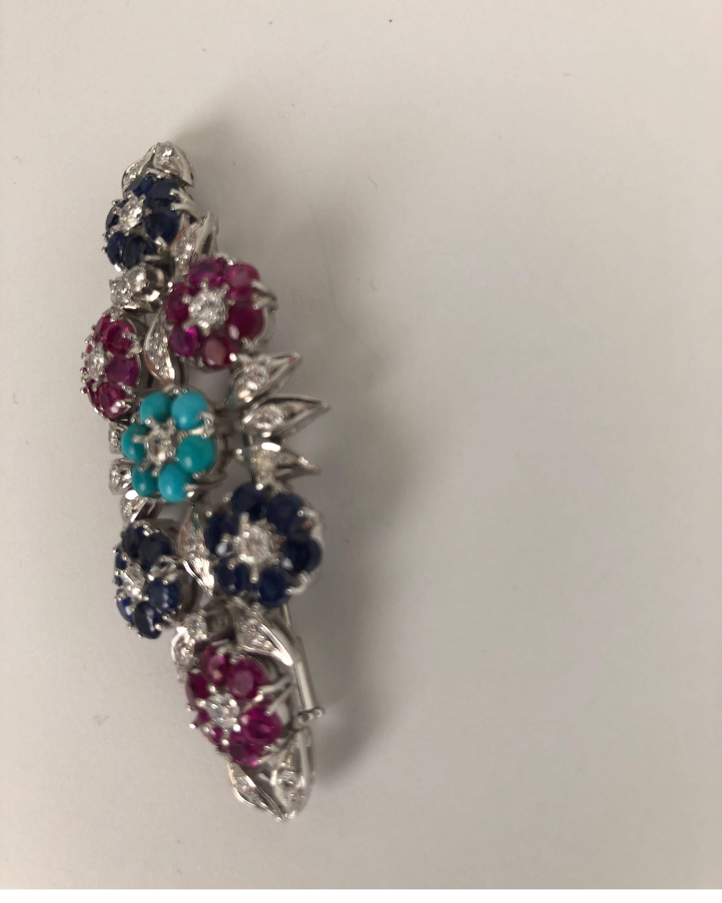 Art Deco Gold 18 Karat Brooch Witt White Diamonds, Blue Sapphire, Ruby and Turquoise For Sale