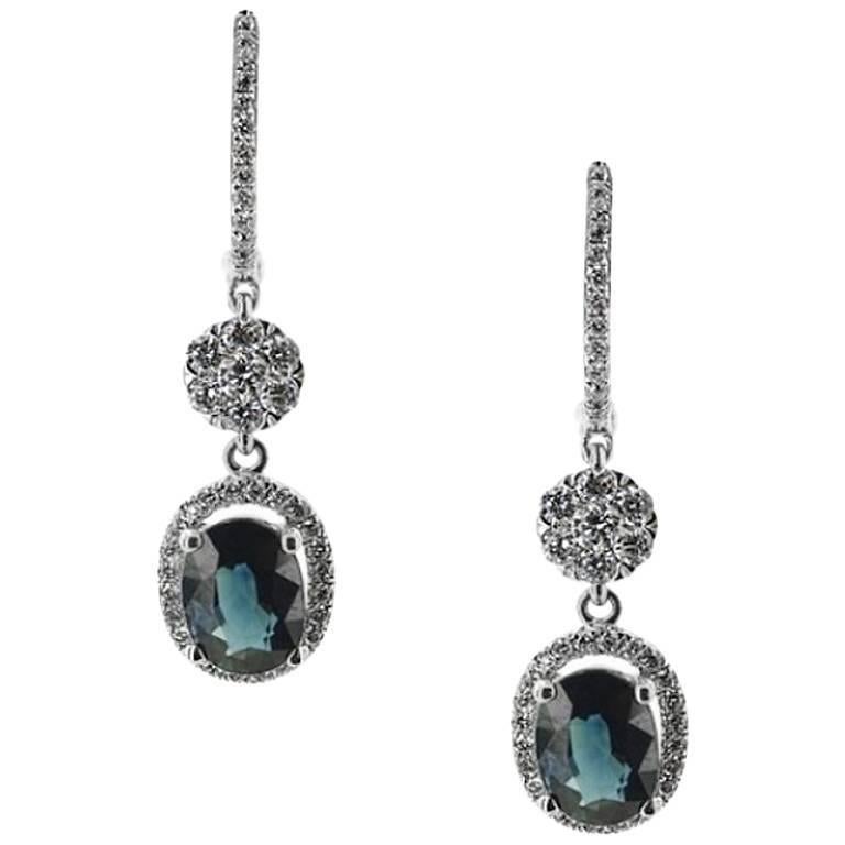 WHITE GOLD DROP EARRINGS WITH OVAL CUT SAPPHIRE AND BRILLIANT CUT DIAMONDS

Set In 18KT Gold


Oval Cut Sapphire Carat: 1.93


Brilliant Cut Diamonds Carat: 0.61
Color: G-H
Clarity: VS-SI


Weight: 3.42 gr