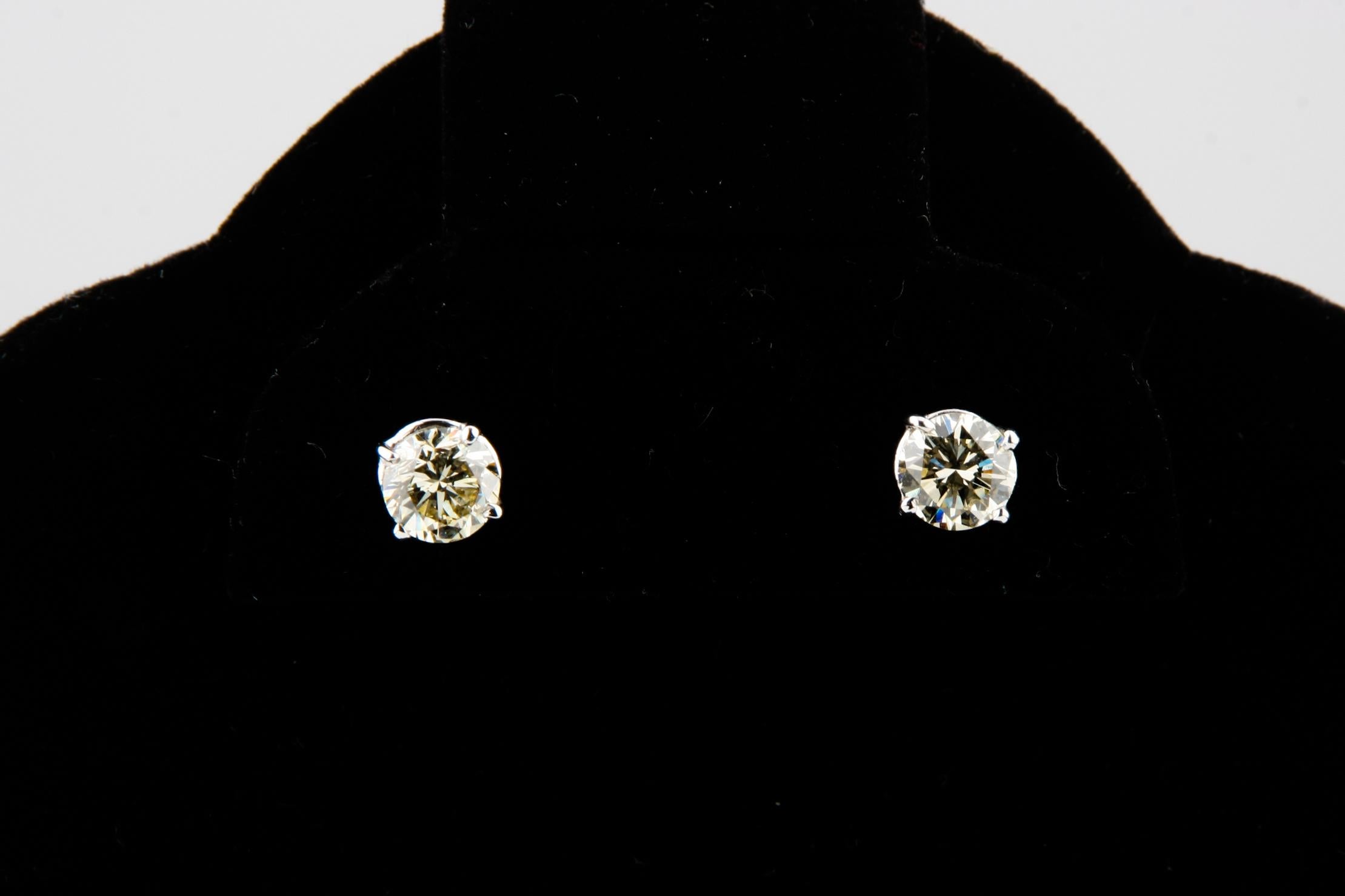 Gorgeous Pair of Diamond Stud Earrings
Feature Gorgeous Huge Round Cut Diamonds
TDW = 2.03 ct
Color: M
Clarity: SI-2
Total Mass = 1.5 grams
Hallmarked 