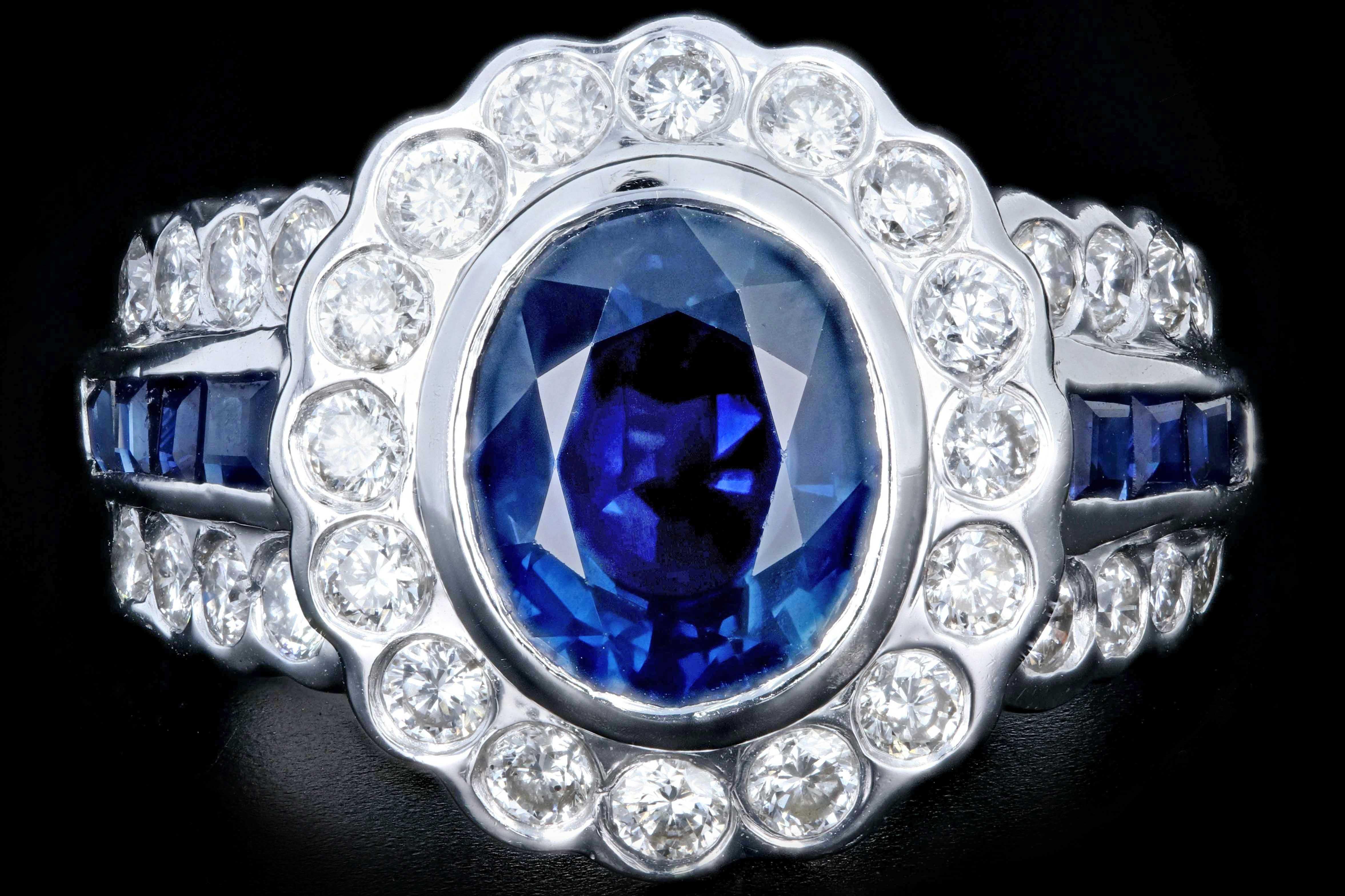 Era: Modern

Composition: 14k white gold 

Primary Stone: approximately 2.5CT natural oval cut sapphire

Primary Stone Weight: Additional approx .5ctw sapphires on sides square step cut

Accent Stone: Round brilliant cut diamonds 

Accent Stone