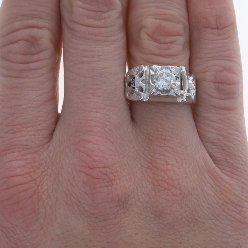 Size: 11 3/4
Sizing Fee: Up 2 sizes for $80 or Down 1 size for $60

Organization: Scottish Rite & Shriners
Era: Vintage

Metal Content: 14k White Gold

Stone Information
Natural Diamond
Carat(s): 1.18ct
Cut: Round Brilliant
Color: G
Clarity: