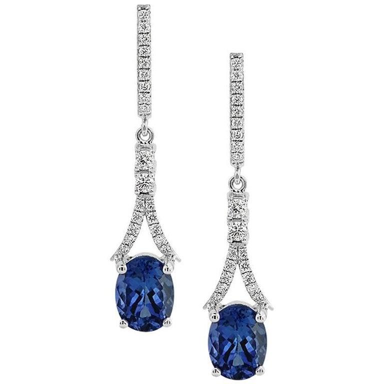 Oval Cut White Gold 3.67 ct Tanzanite and Brilliant Cut 0.43 ct Diamonds Earrings For Sale
