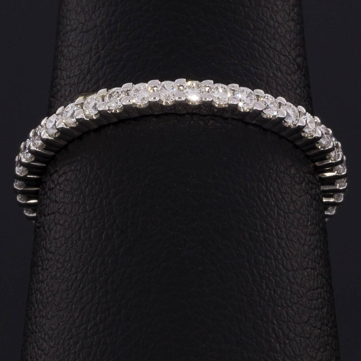 shared prong diamond eternity band