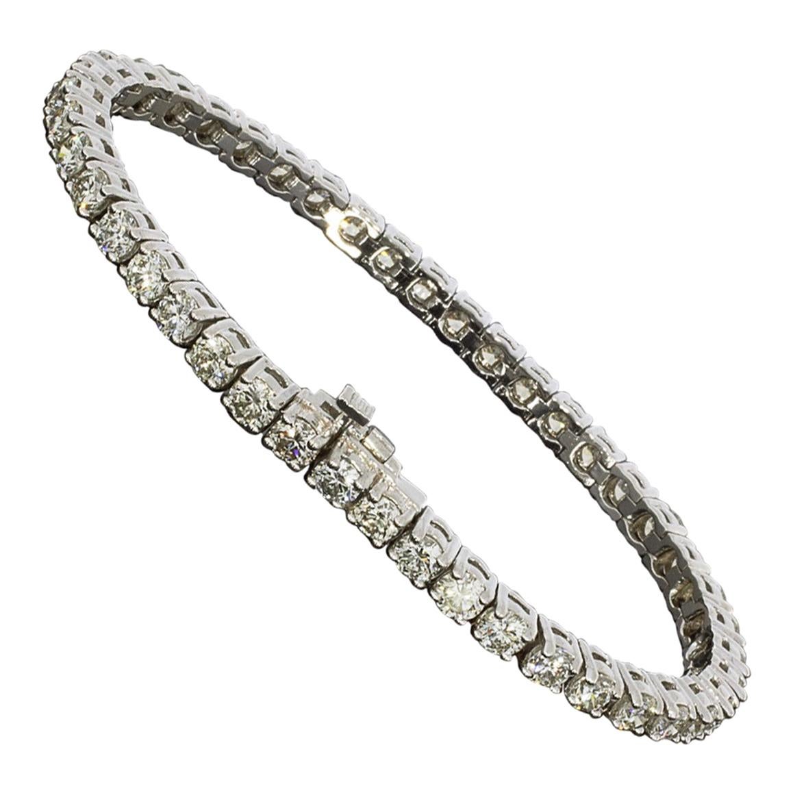 Item Details
Estimated Retail $25,000.00
Metal White Gold
Total Carat Weight (TCW) 8.93 ctw
Style Tennis
Width 3.75 mm
Fastening Box Clasp
Metal Purity 14k

Stone 1 Information
Stone Type Diamond
Stone Shape Round
Stone ColorI
ClaritySI2
Count