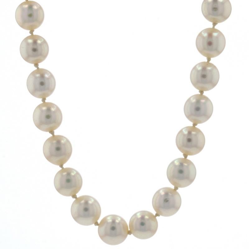 Metal Content: 14k White Gold 

Stone Information: 
Genuine Akoya Pearls
Diameters: 
7.1mm - 7.4mm (strand)
4.7mm - 4.9mm (clasp halo accents)
6mm (approximately) (clasp halo center)

Necklace Style: Knotted Strand 
Fastening Type: Tab Box