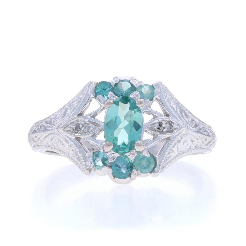 Size: 5 1/2
Sizing Fee: Up 1 size for $50 or Down 1 size for $50

Metal Content: 14k White Gold

Stone Information

Natural Alexandrite
Carat(s): .44ct
Cut: Oval

Natural Alexandrites
Carat(s): .24ctw
Cut: Round

Natural Diamonds
Carat(s):
