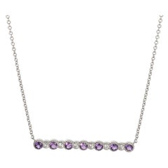Ciondolo in oro bianco con ametista e diamante