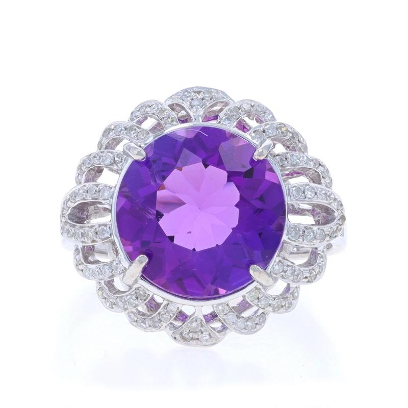 Size: 6 1/2
Sizing Fee: Up 2 sizes for $40 or Down 1 size for $40

Metal Content: 14k White Gold

Stone Information

Natural Amethyst
Carat(s): 3.35ct
Cut: Round
Color: Purple

Natural Diamonds
Carat(s): .50ctw
Cut: Single
Color: G - H
Clarity: I1 -