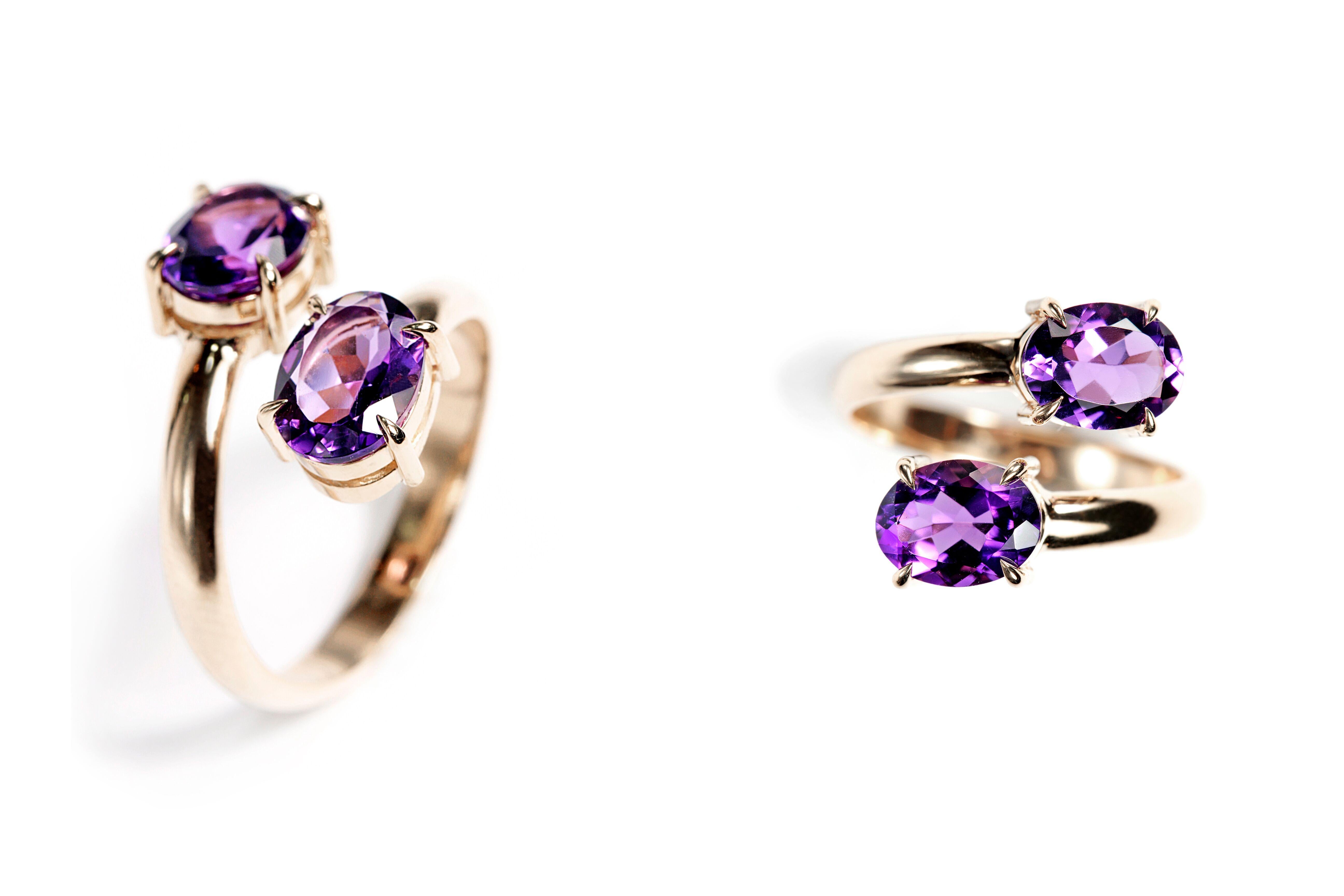 Designed exclusively by Ara Vartanian, this 18k White Gold open style ring features two Amethysts, in an oval faceted cut with a total weight of 2,31ct (two carats and thirty-one points). 
