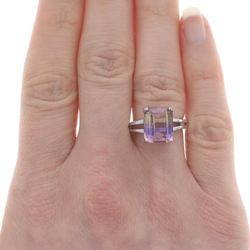 Size: 6
Sizing Fee: Up 2 sizes for $40 or Down 2 sizes for $35

Metal Content: 14k White Gold

Stone Information
Natural Ametrine
Carat(s): 3.90ct
Cut: Emerald
Color: Purple & Yellow

Total Carats: 3.90ct

Style: Cocktail Solitaire
Features: Split