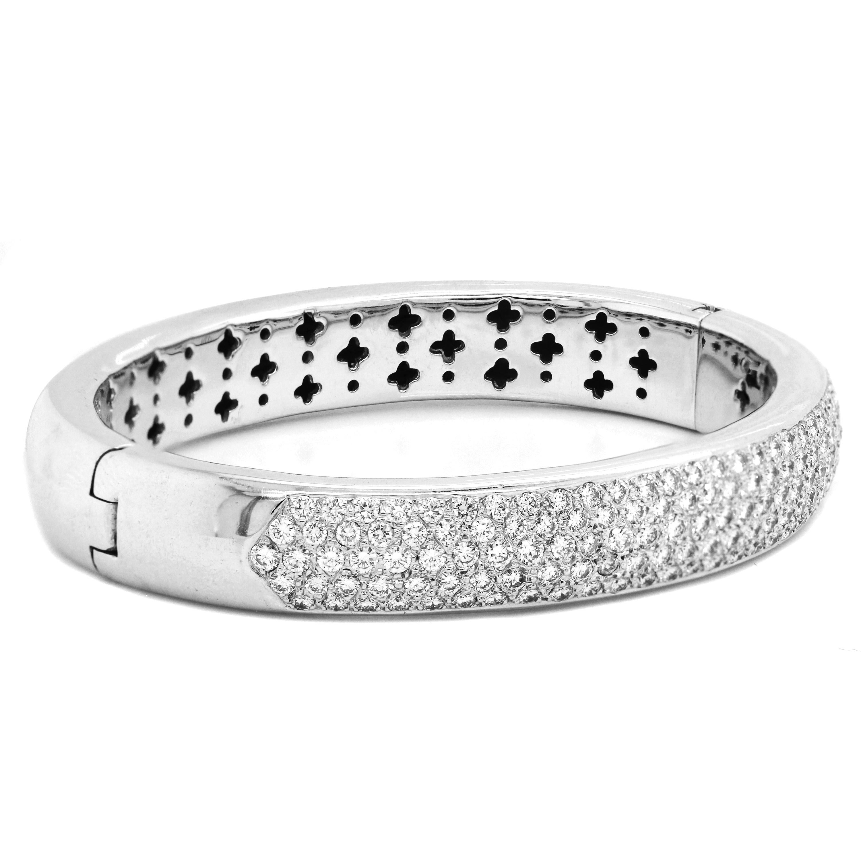 IF YOU ARE REALLY INTERESTED, CONTACT US WITH ANY REASONABLE OFFER. WE WILL TRY OUR BEST TO MAKE YOU HAPPY!

18K White Gold and Diamond Bangle Bracelet 

5.05 carat G color, VS clarity Diamonds

Bracelet comes standard Size 7

Made in USA