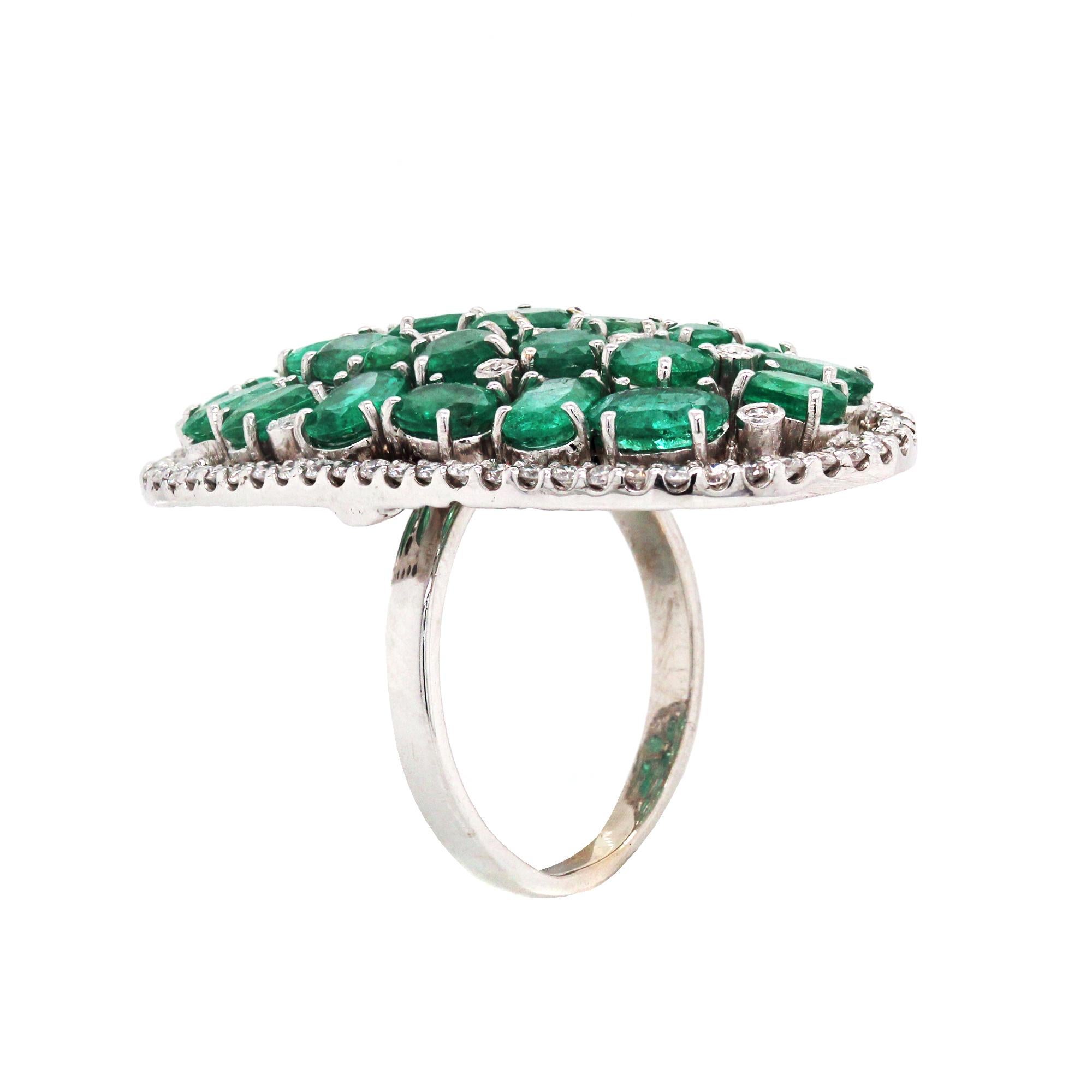 Oval Cut White Gold and Diamond Cluster Ring with Emeralds