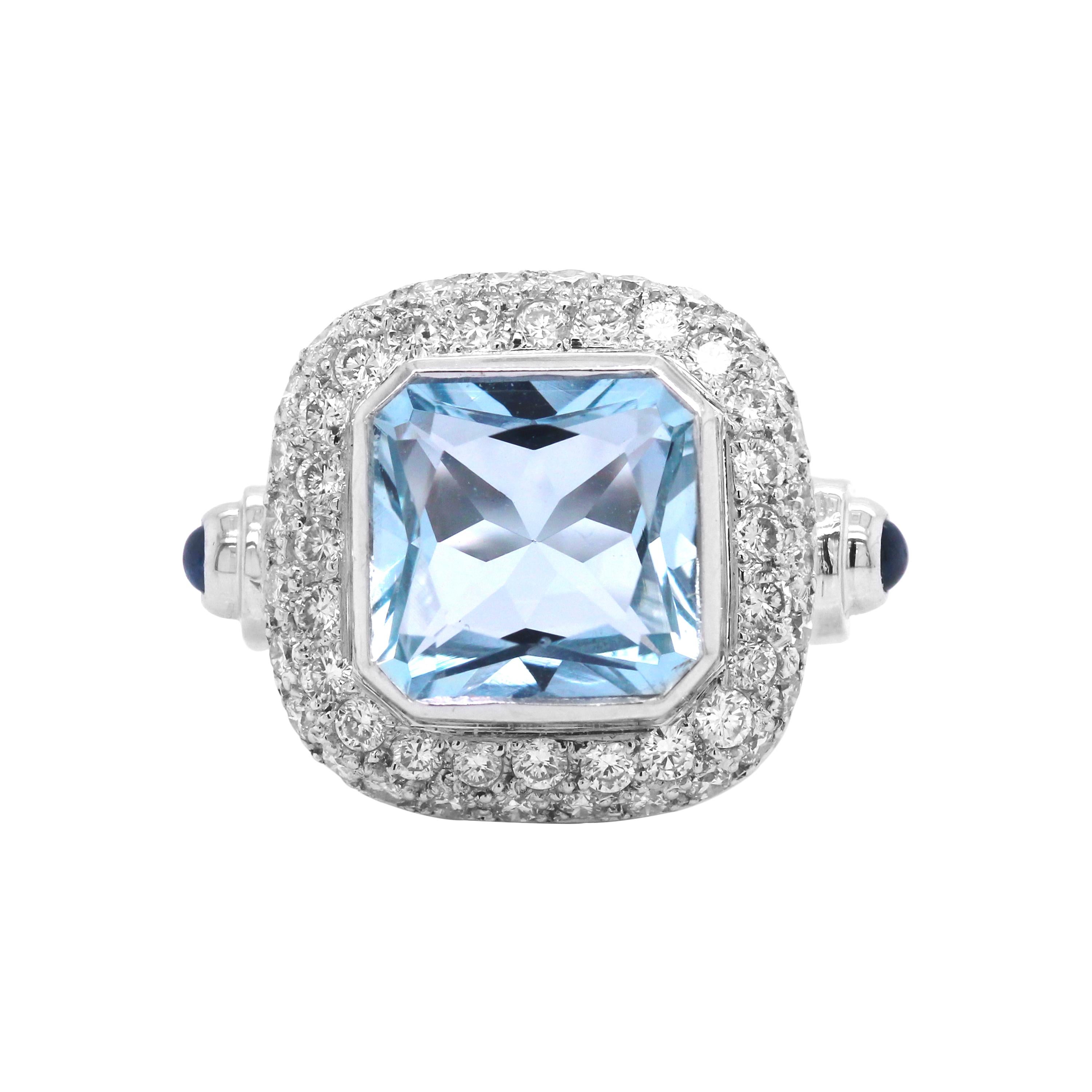 18K White Gold and Diamond Cocktail Ring with Cushion Cut Aquamarine Center

This stunning yet intriguing ring features a beautiful Aquamarine center with diamonds set all throughout. Both edges of the ring are a cabochon-cut Blue sapphire.

7.50