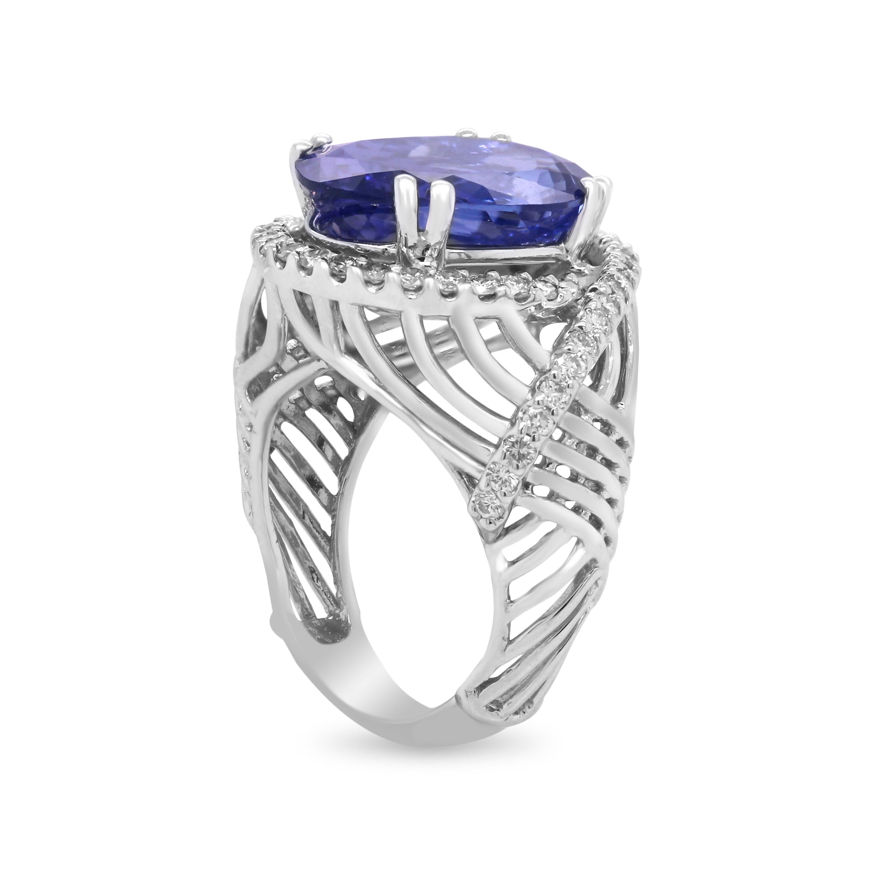 14K White Gold and Diamond Cocktail Ring with Tanzanite Center

This fun and everyday cocktail ring features a high-quality, oval-cut, Tanzanite center

10 carat apprx. Tanzanite center 

1.56 carat G color, VS clarity diamonds

Ring face is 20mm