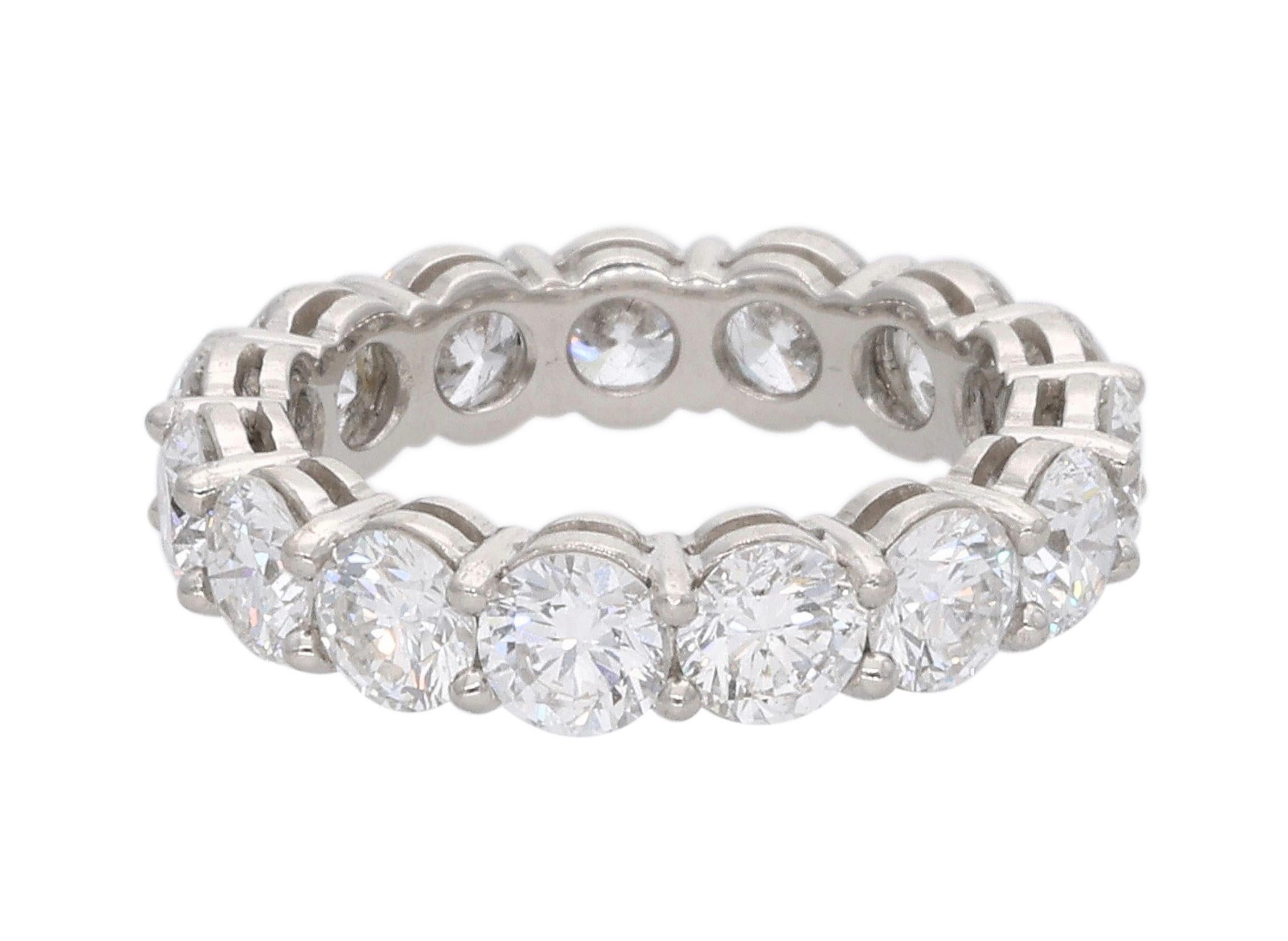 A band ring composed of 15 round brilliant cut diamonds.

- Diamonds weigh a total of approximately 3.75 carats
- 18 karat white gold
- Total weight 5 grams
- Size 4.75

The condition report is Very Good. 

Perfect for any occasion. 